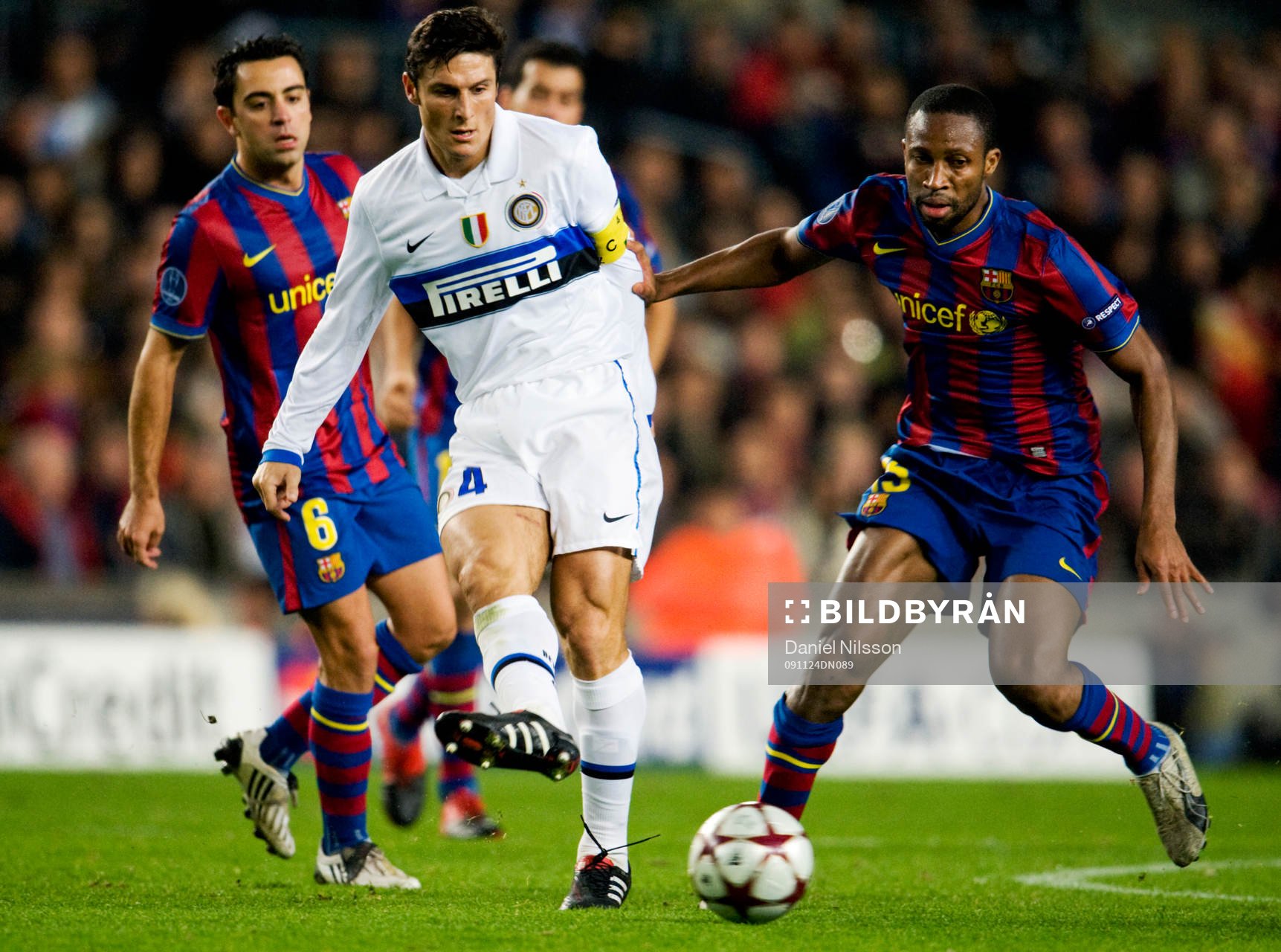   Xavi och Seydou Keita, Barcelona och Javier Zanetti, Inter.
