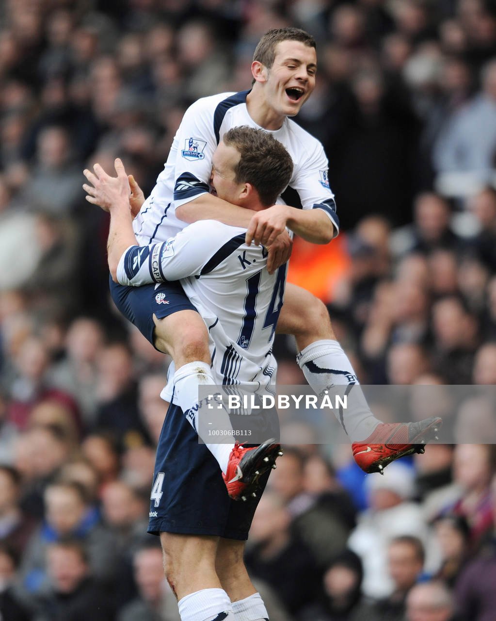Jack Wilshere och Kevin Davies, glädje, jubel