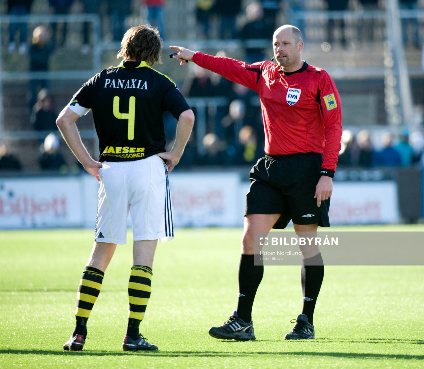 Domare Martin Hansson och Nils-Eric Johansson, AIK