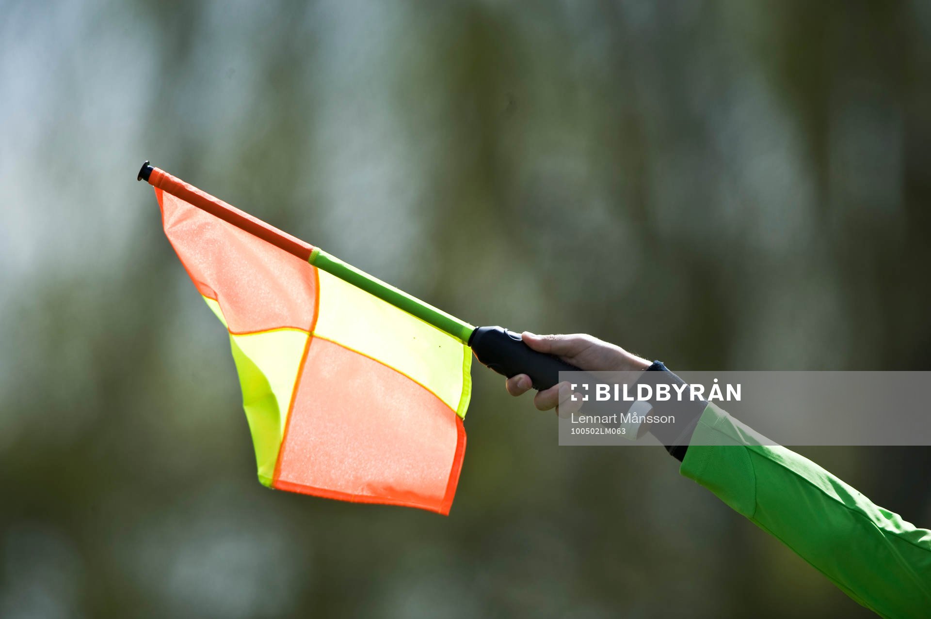 Flagga, assisterande domare, genre