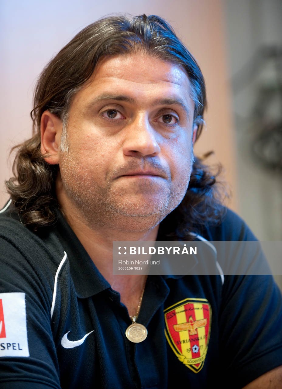 Özcan Melkemichel, Tränare