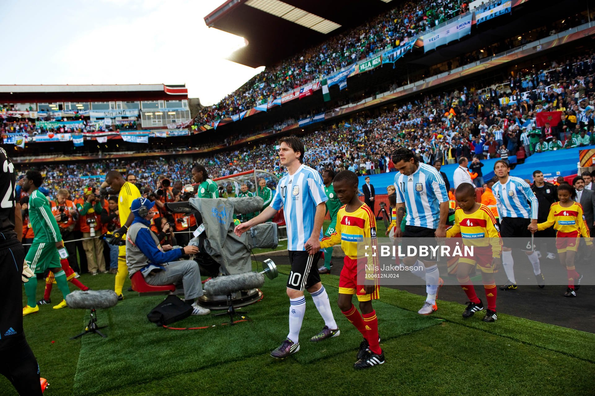 Lionel Messi, Carlos Tevez och GabrielHeinze  Argentina