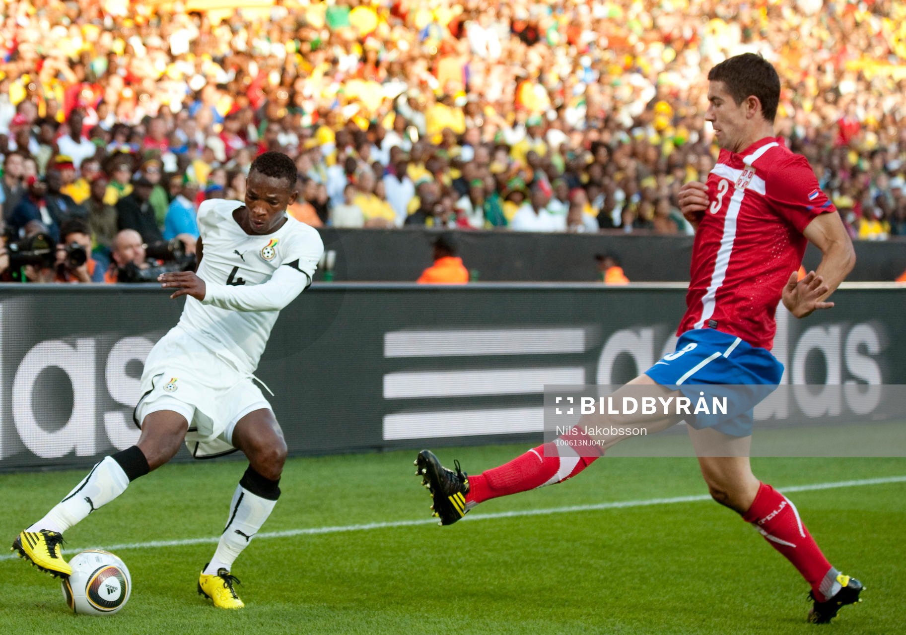  Asamoah Gyan, Ghana och  Alexandar Kolarov, Serbien