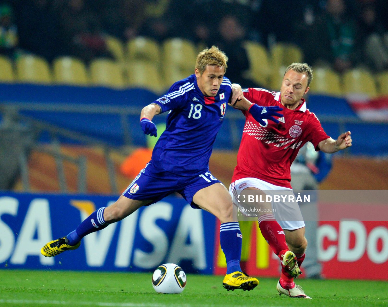 Keisuke Honda, Japan och Lars Jacobsen, Danmark