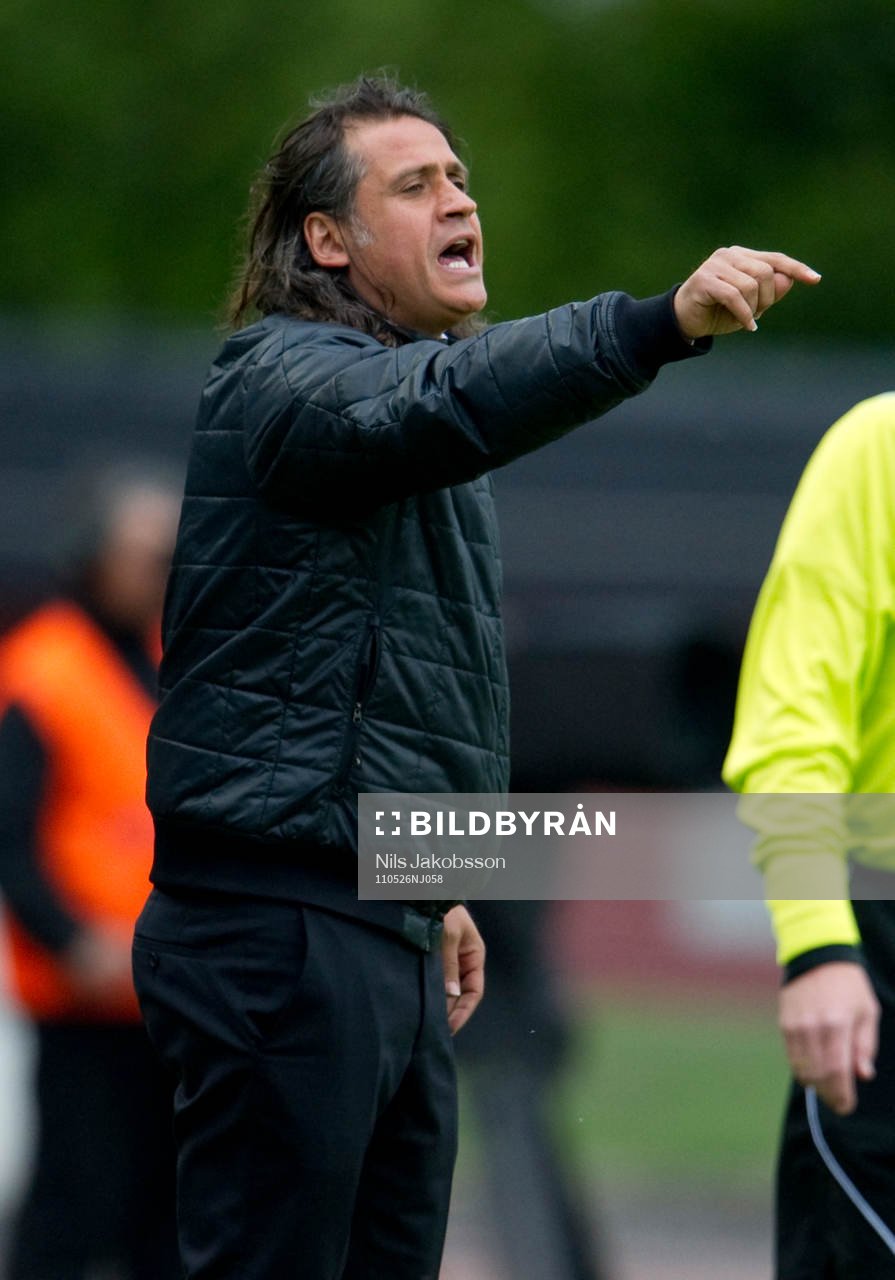 Özcan Melkemichel, tränare