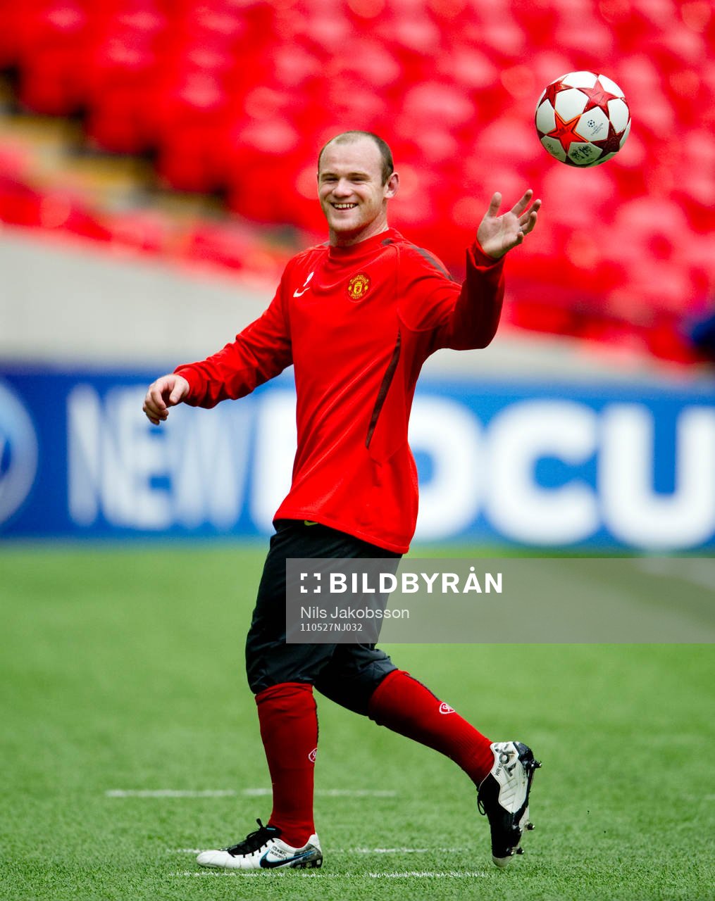 Wayne Rooney skrattar