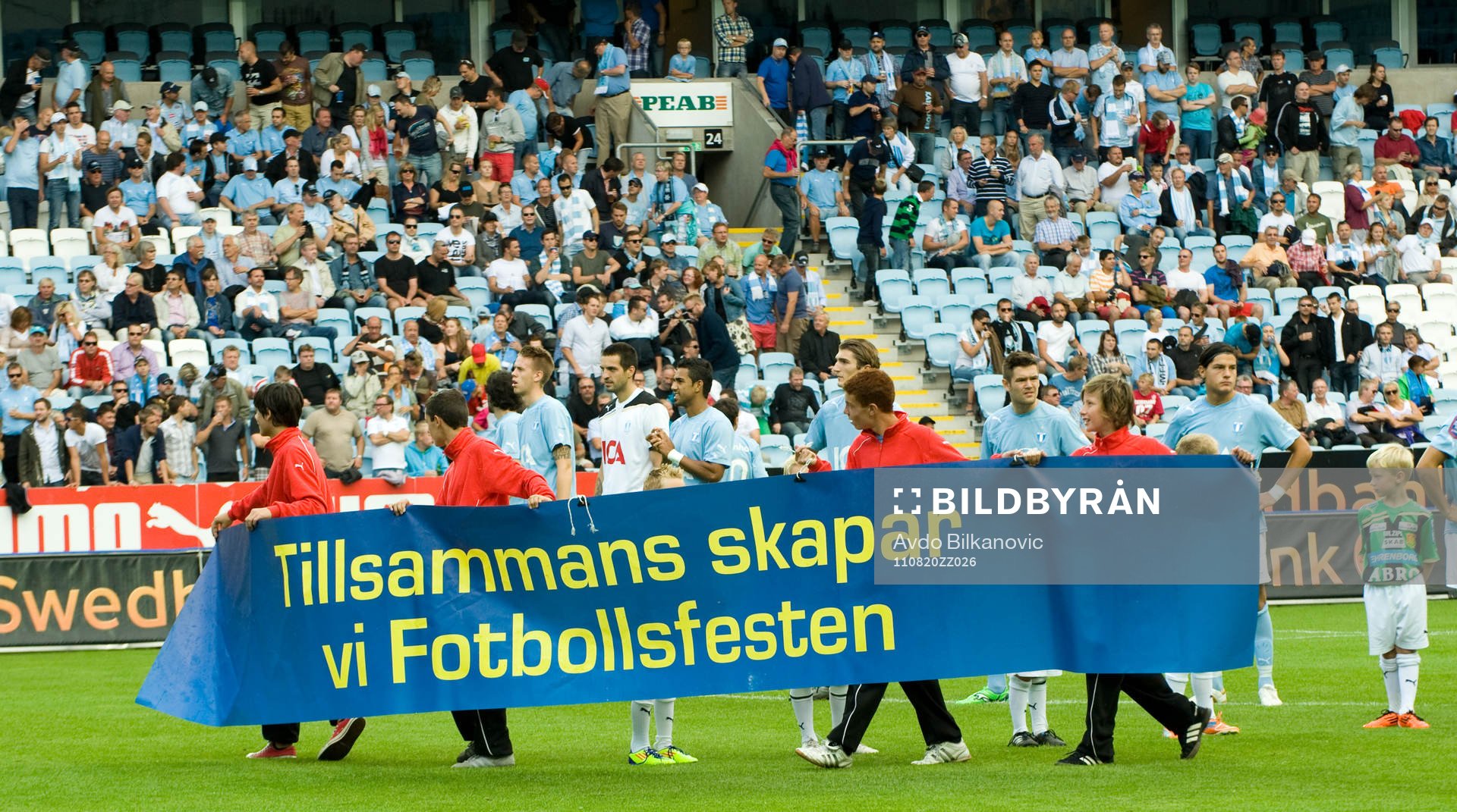 Tillsammans skapar vi Fotbollsfesten, skylt
