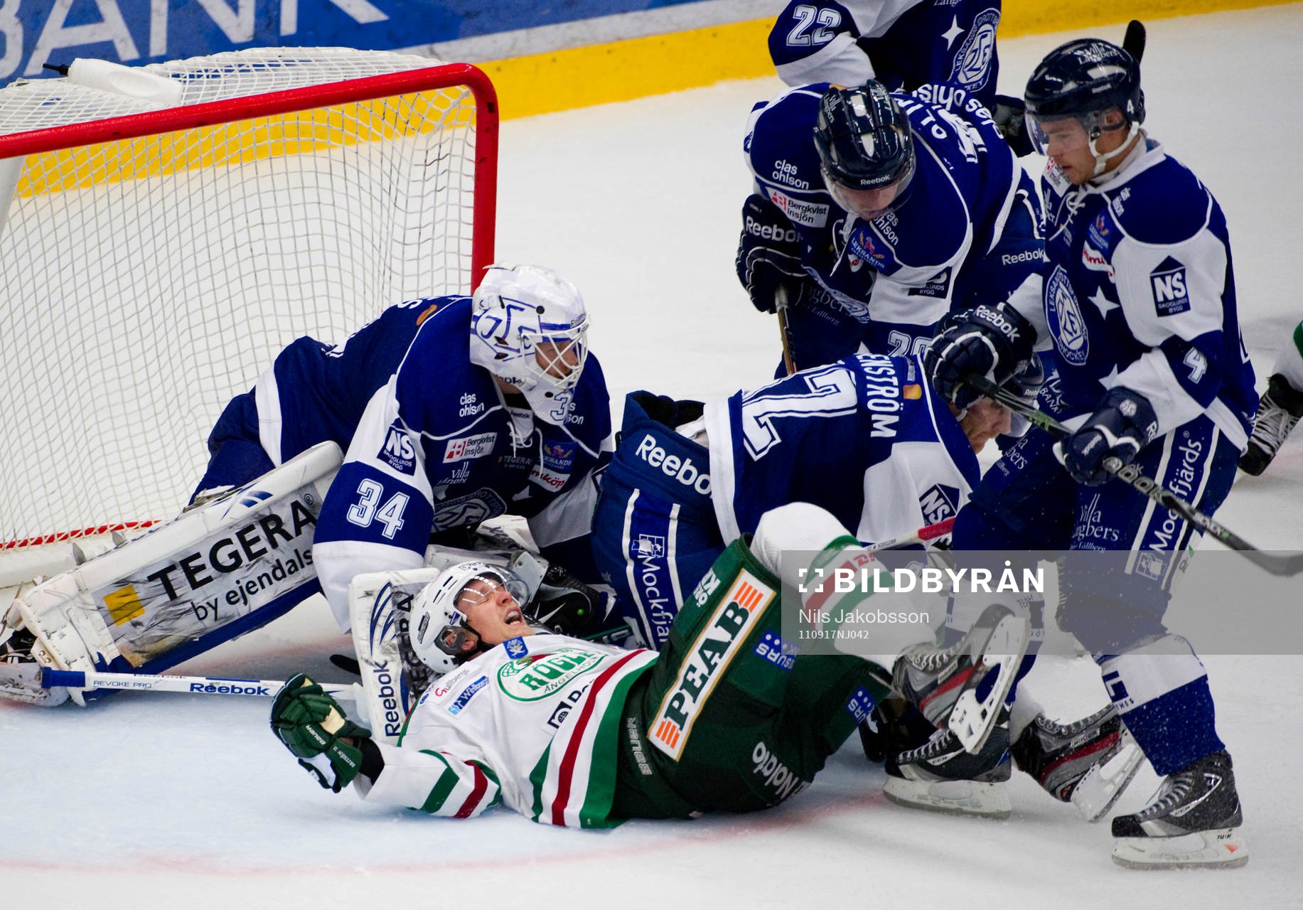 Ted Brithén, Rögle, omringad av spelare från Leksand