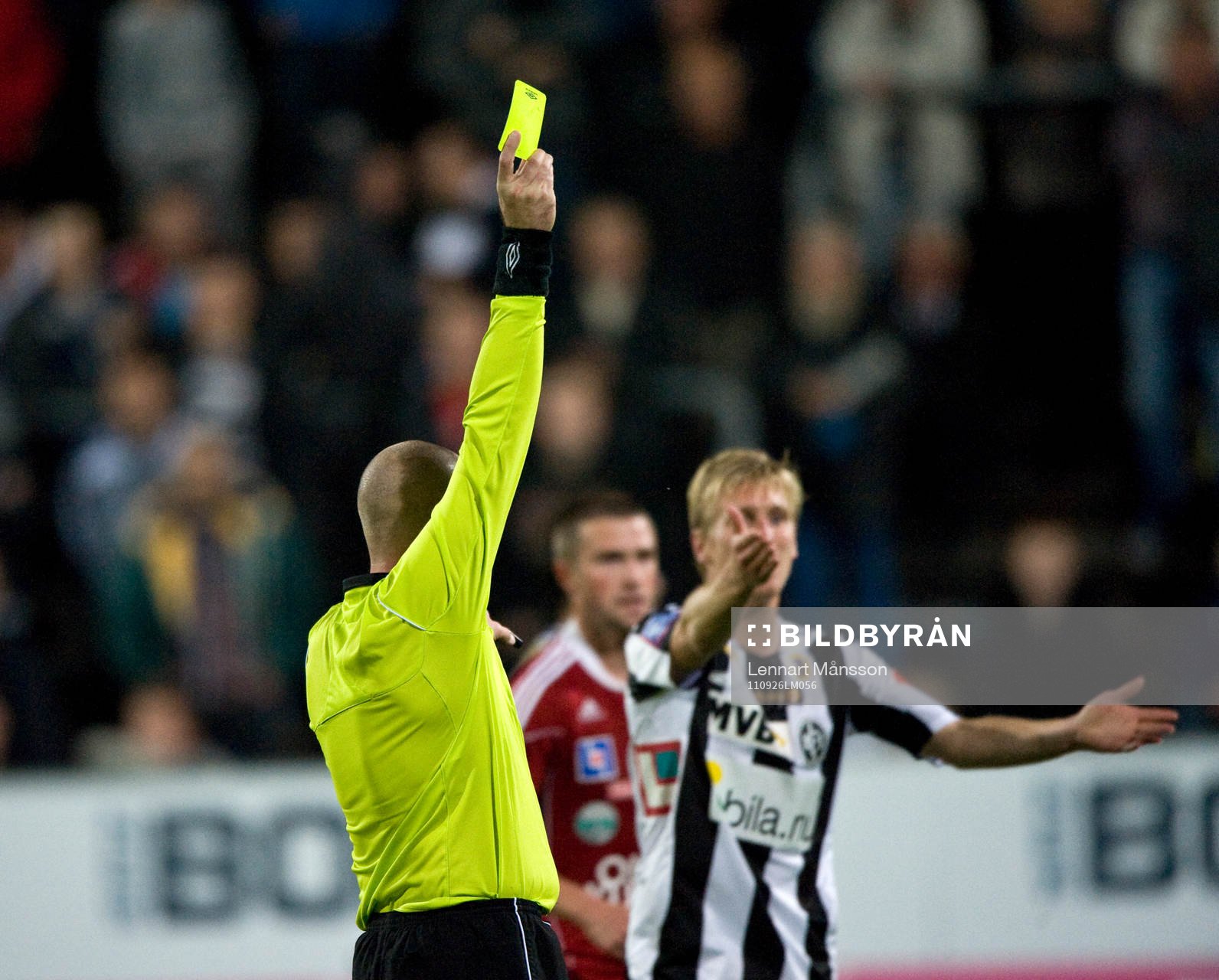Domare, gult kort, varning