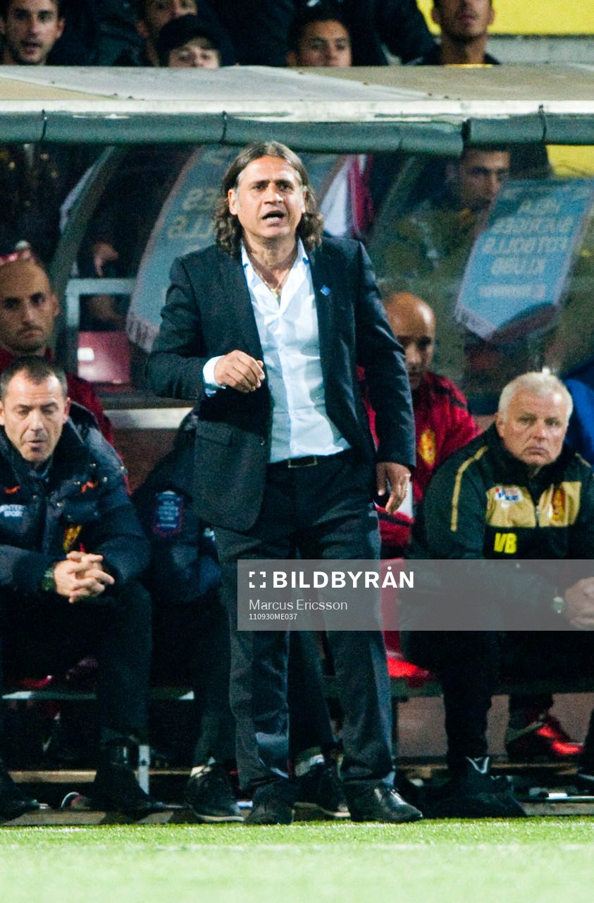 Özcan Melkemichel, tränare