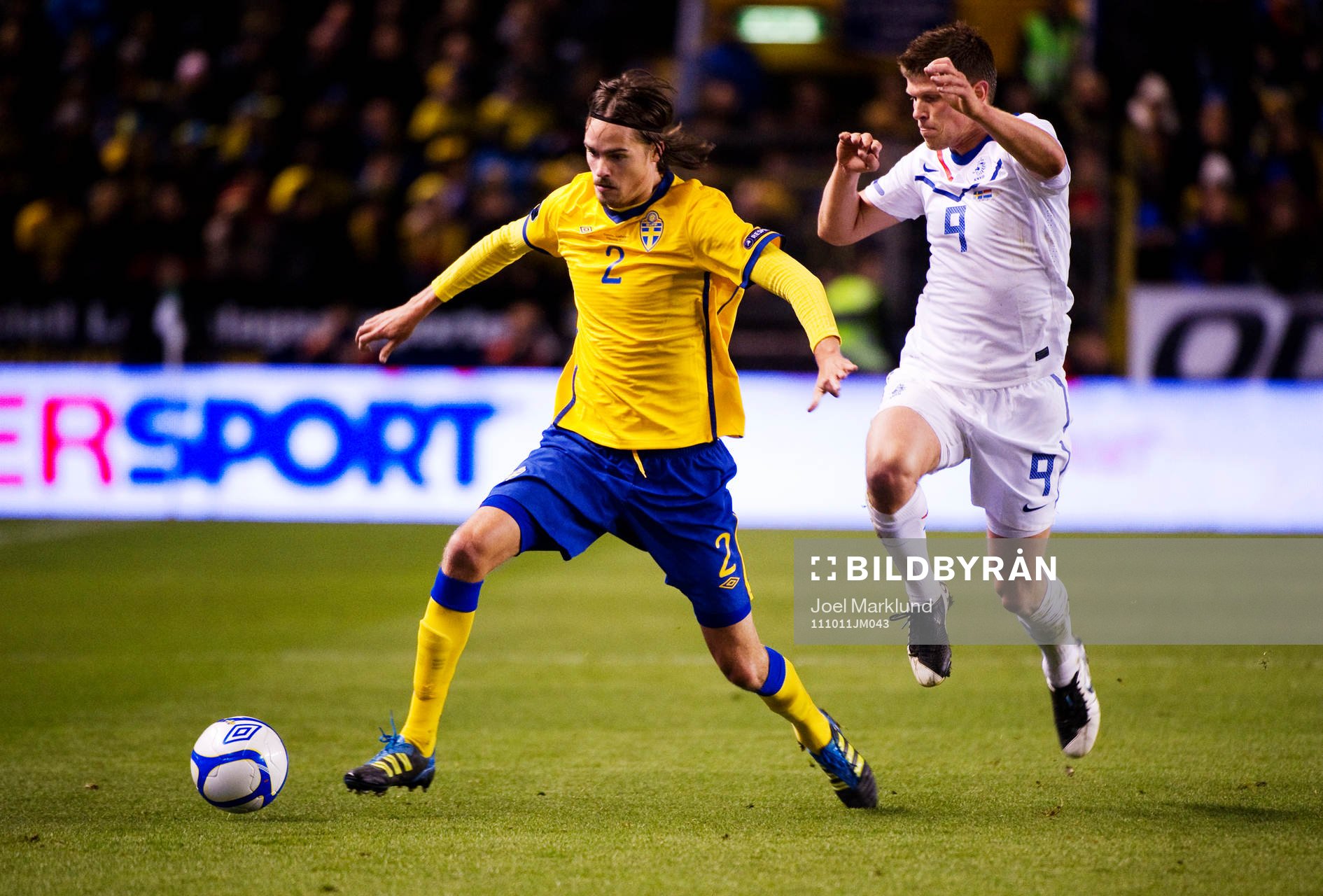 Mikael Lustig, Sverige, och Klaas Jan Huntelaar, Holland