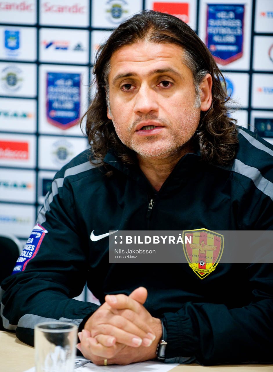 Özcan Melkemichel, tränare