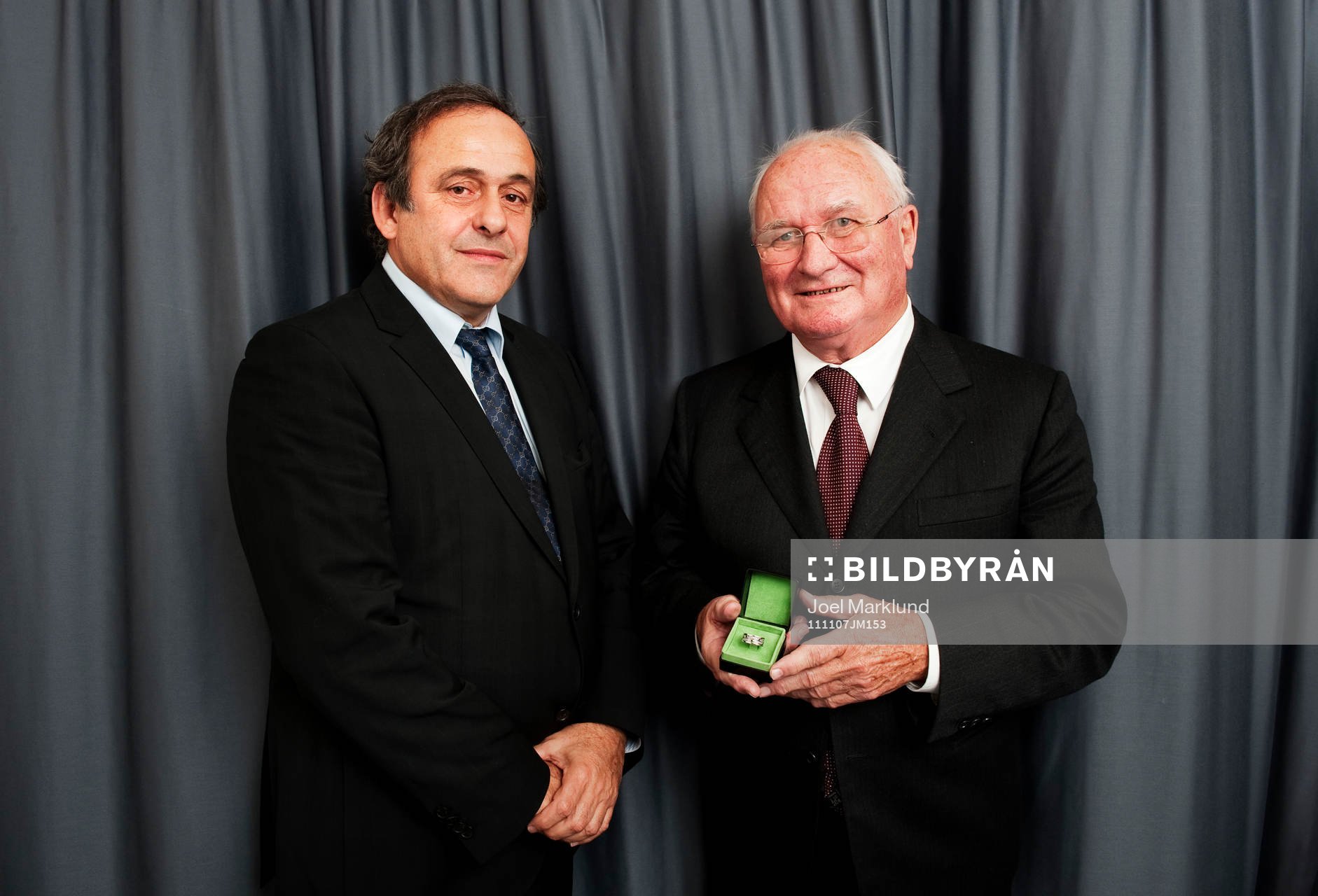 Michel Platini, ordförande UEFA, och mottagaren av