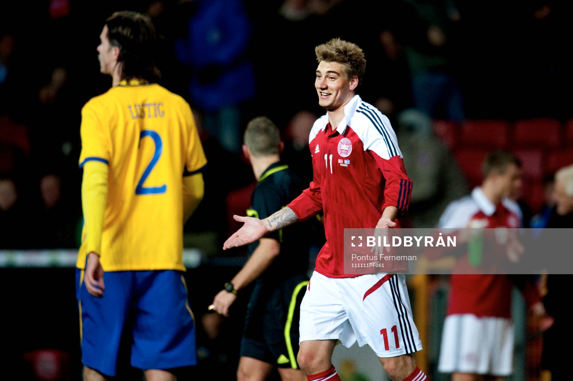 Mikael Lustig, Sverige, Niklas Bendtner, Danmark
