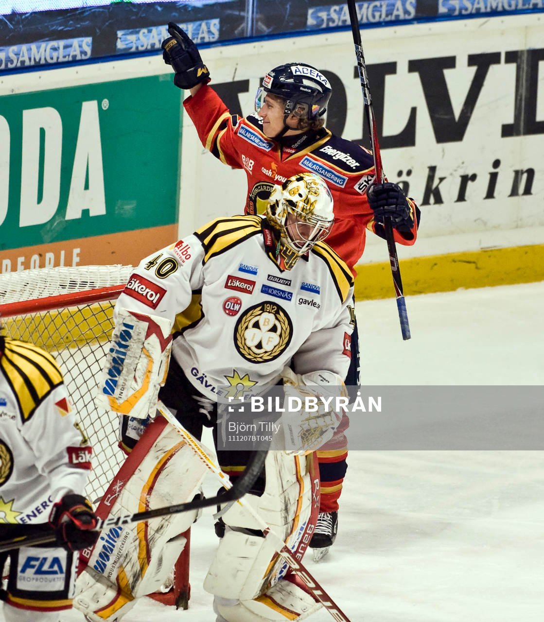 John Norman, Djurgården och Johan Holmqvist, målvakt,