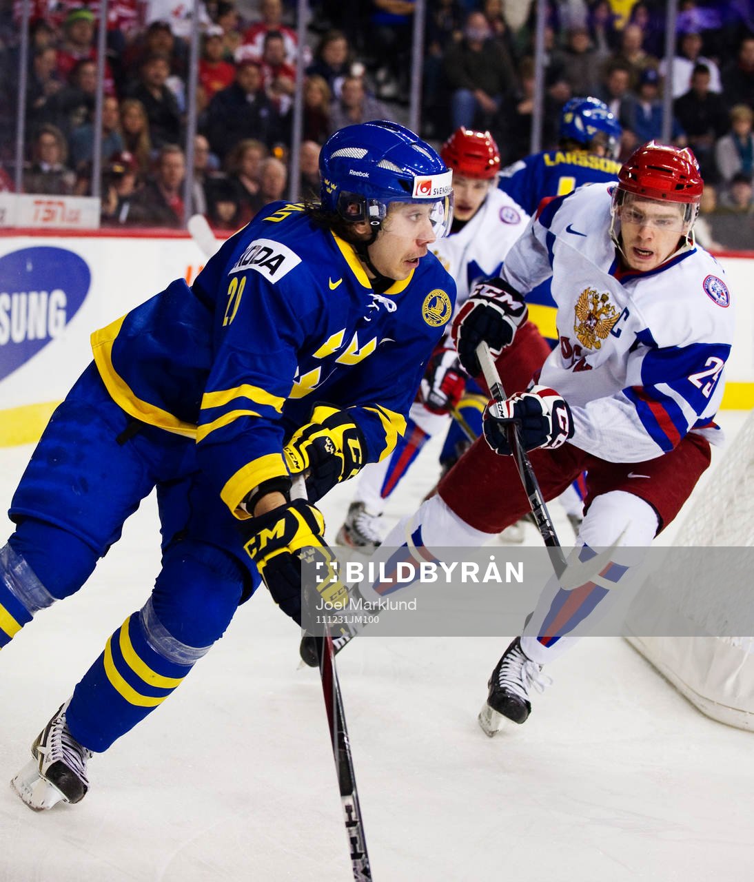 Mika Zibanejad, Sverige, och Yevgeni Kuznetsov, Ryssland