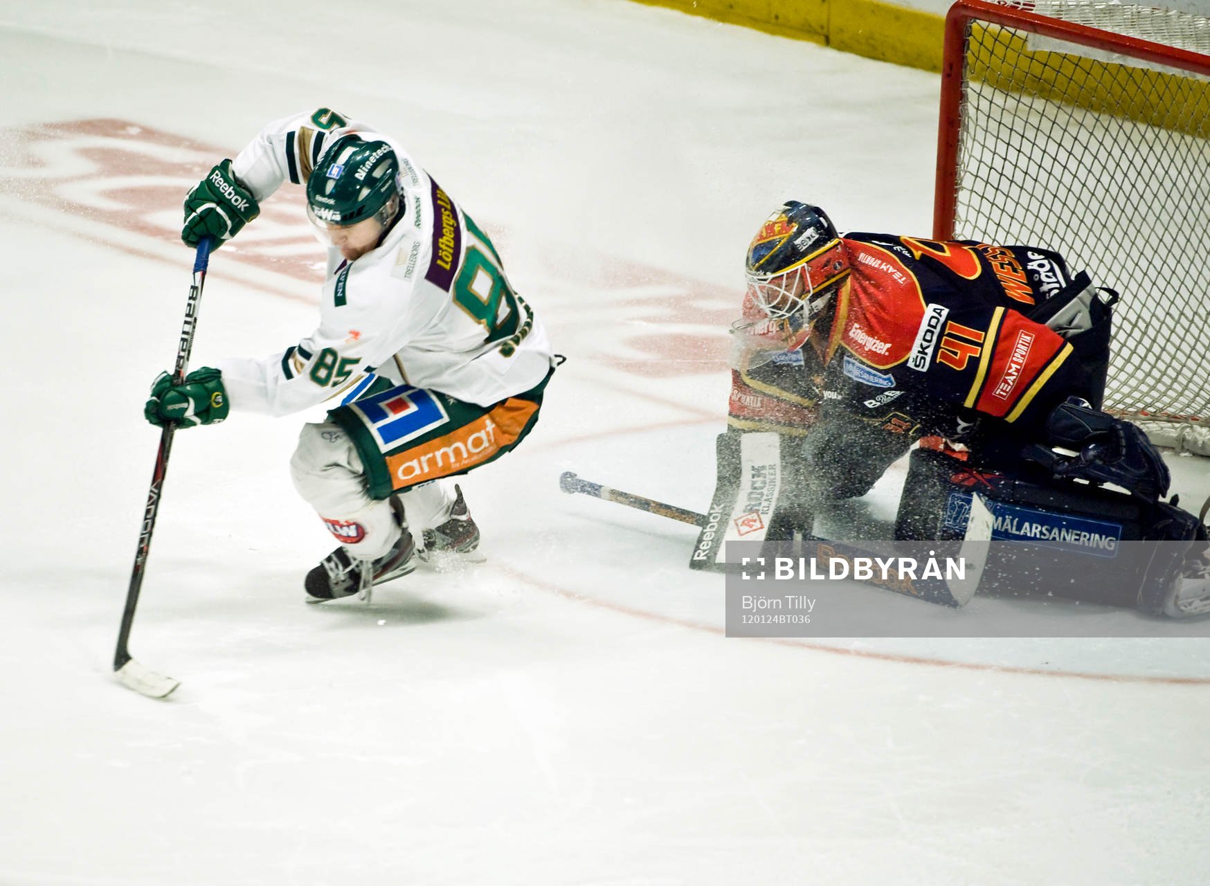 Mikael Johansson, Färjestad och Gustaf Wesslau, målvakt,