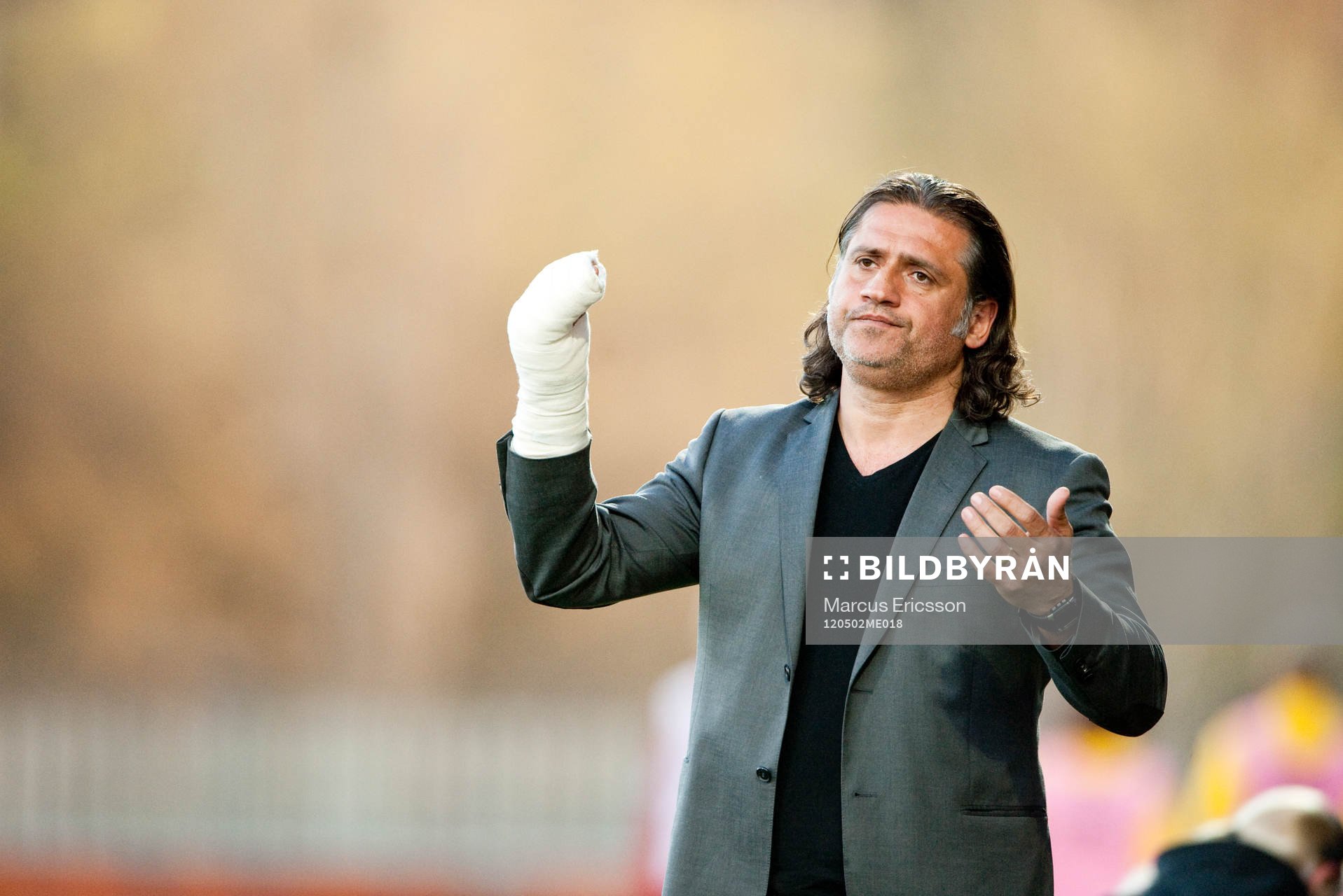 Özcan Melkemichel, tränare