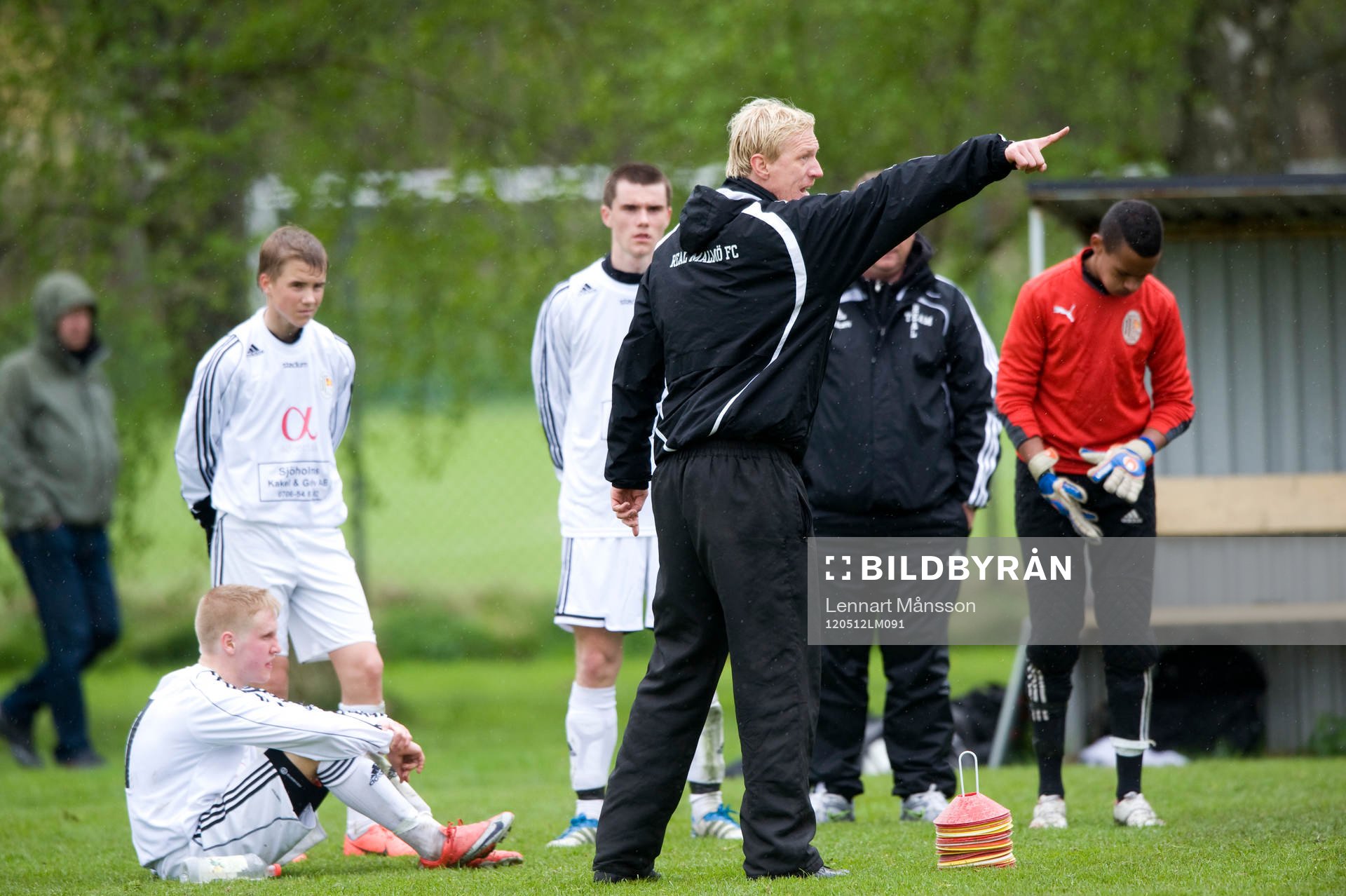 Ledare instruerar sina spelare i paus