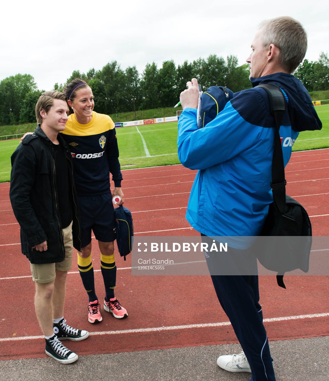 Staffan Stjernholm, presschef, Sverige, fotograferar Lotta