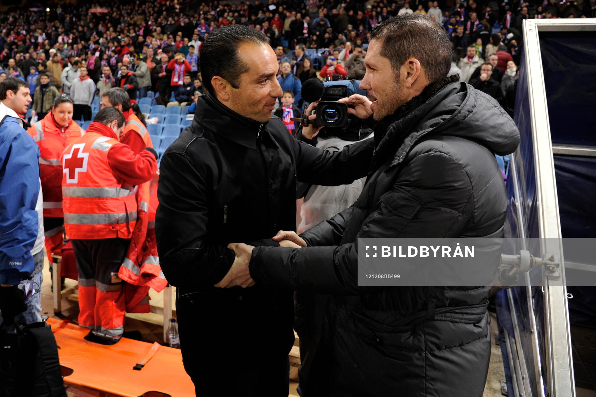 iego Pablo Simeone, of Club Atletico de Madrid and Coach Jose Luis Oltra, of Club Deportivo la Coruna