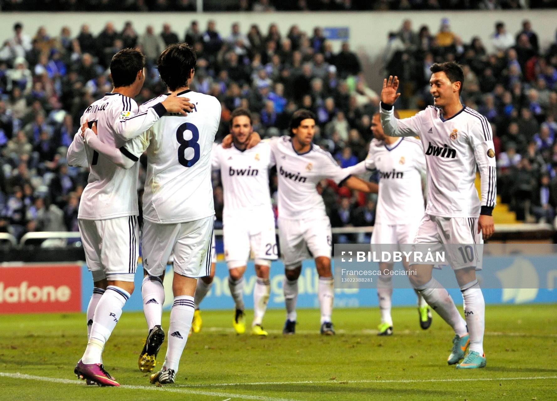 Real Madrid players celebrating victory goal scored by