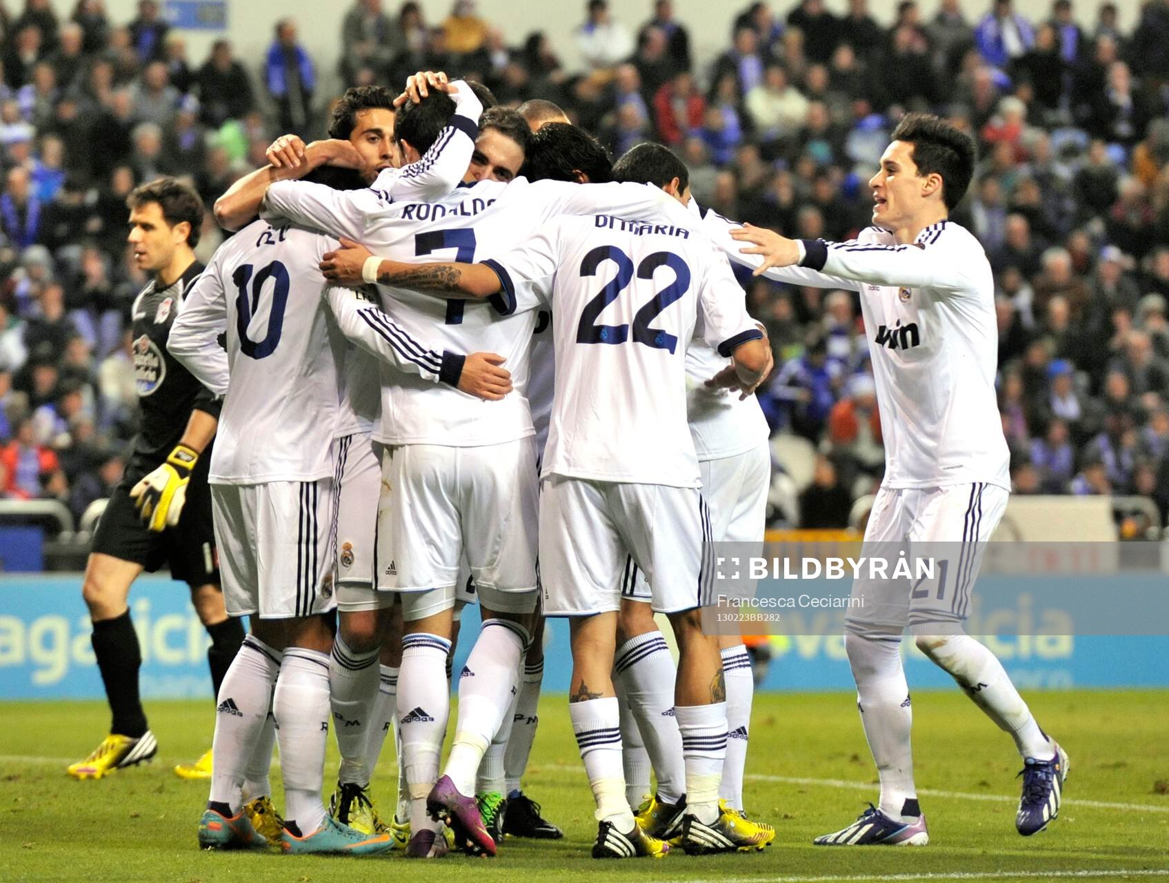 Real Madrid players celebrating victory goal scored by