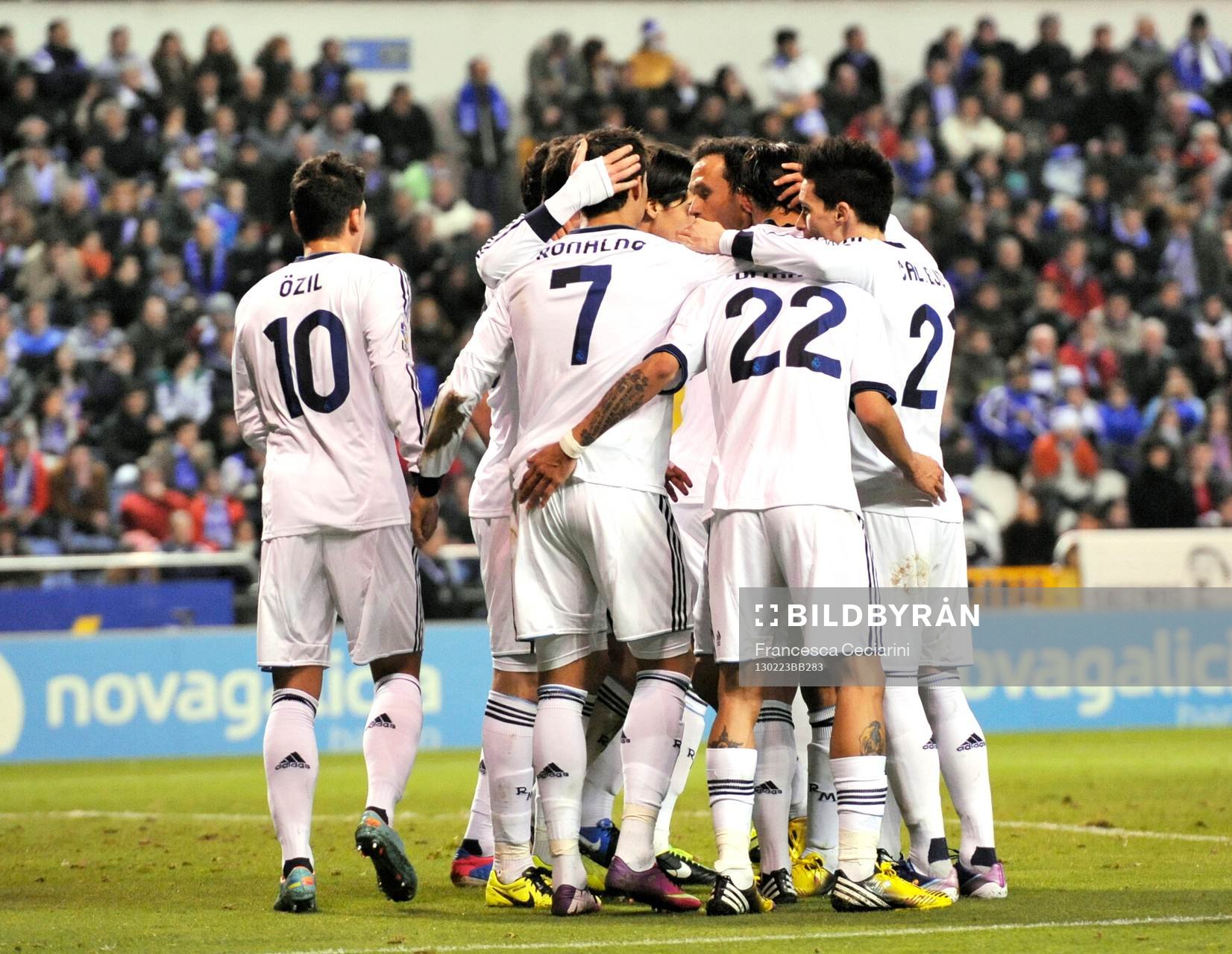 Real Madrid players celebrating victory goal scored by