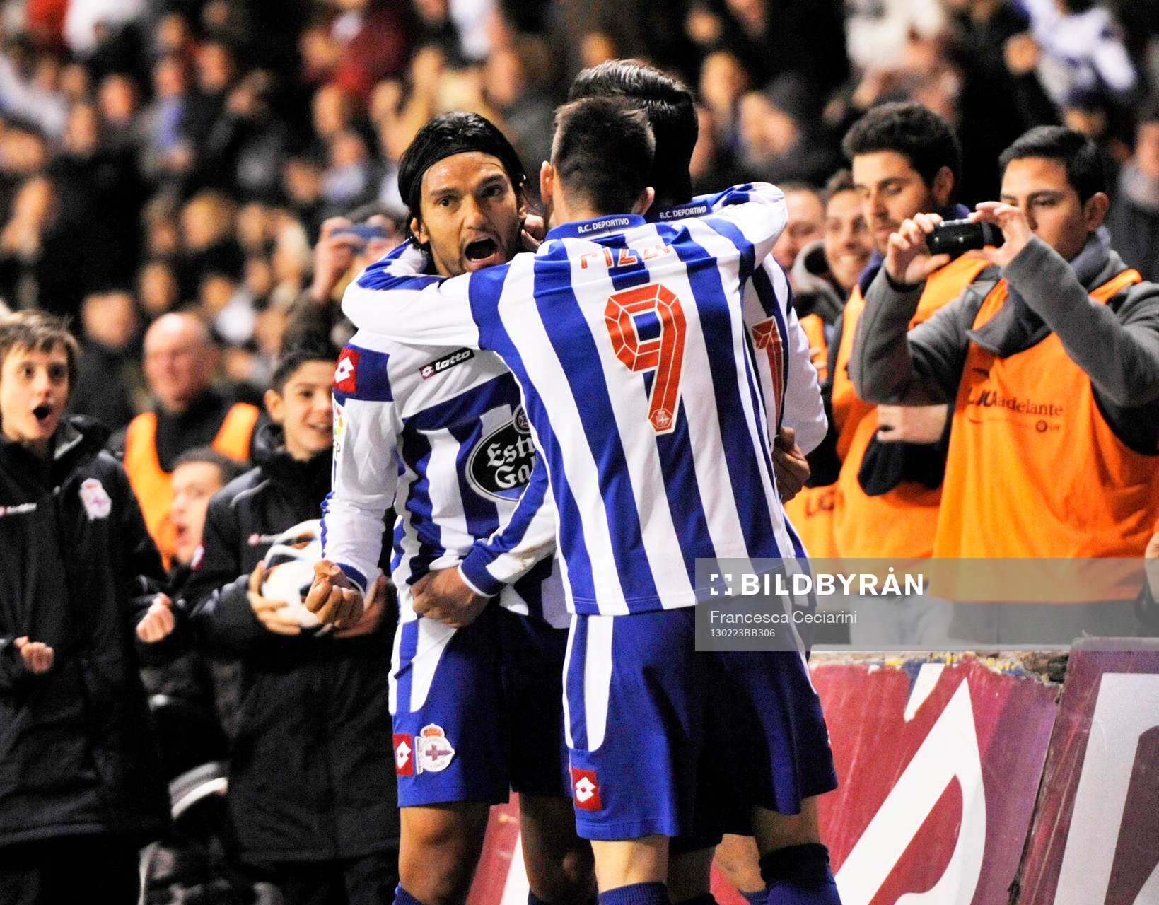 Riki celebrating his goal with Abel Aguilar and Pizzi -