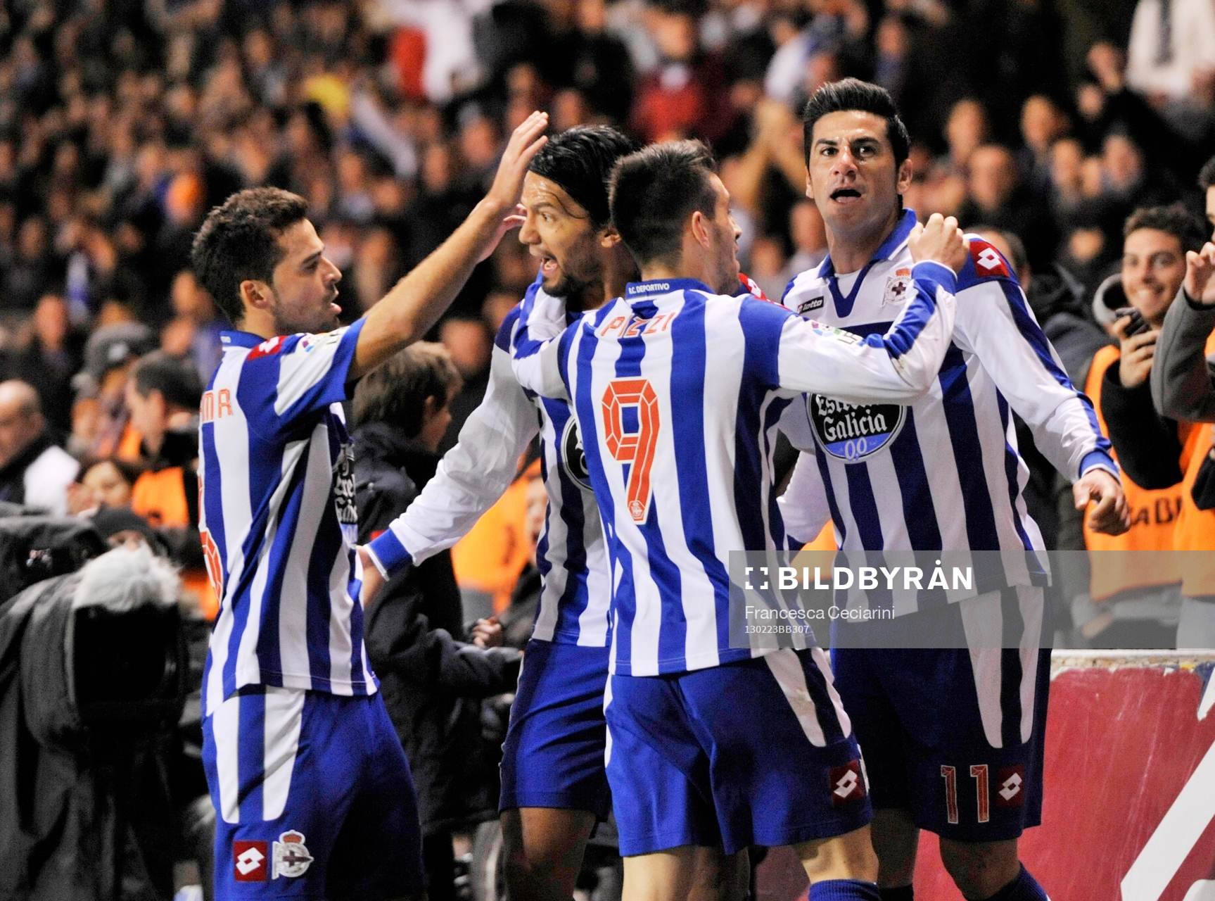 Riki celebrating his goal- with Pizzi, Abel Aguilar and