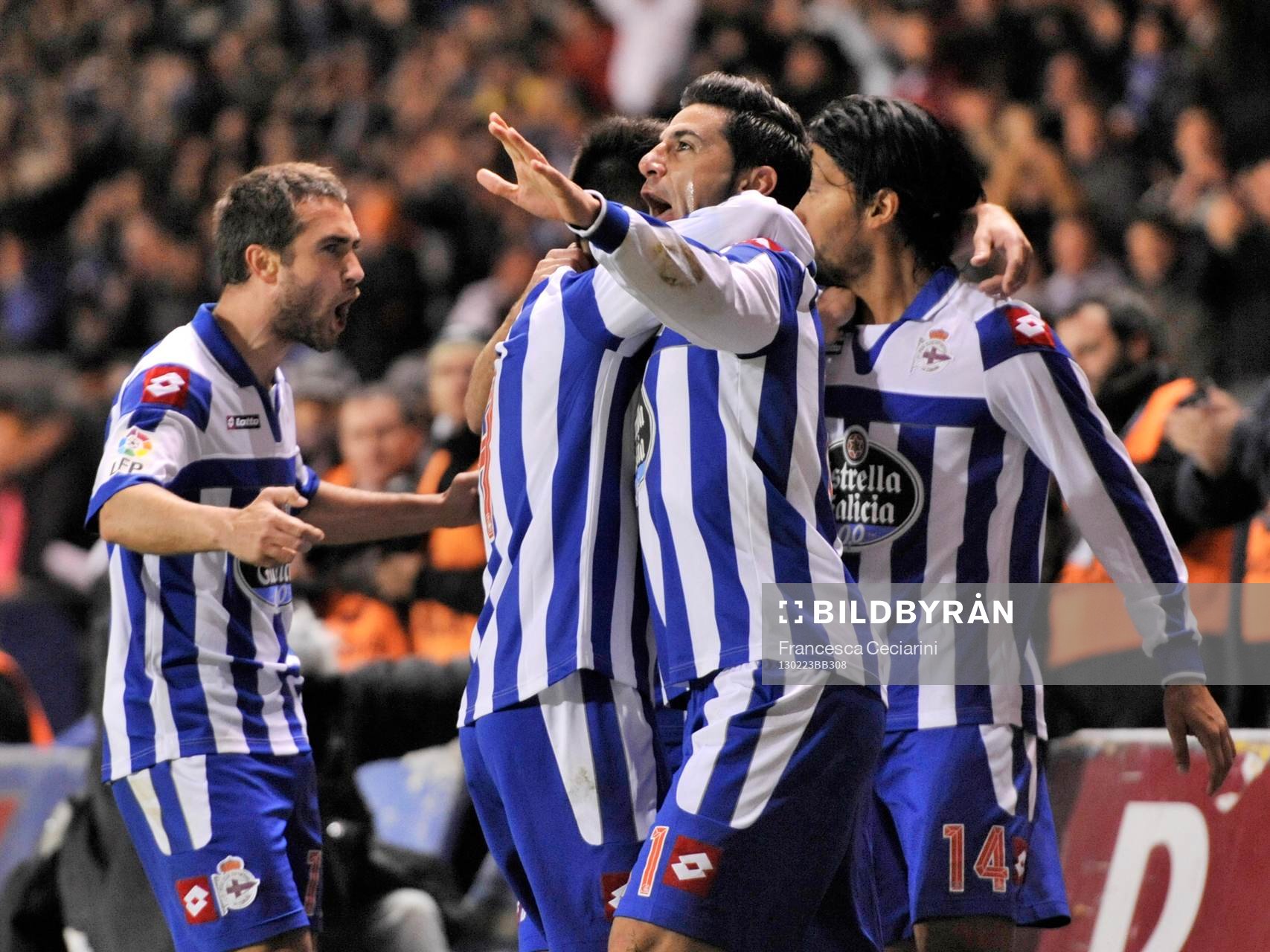 Riki celebrating his goal- with Pizzi, Abel Aguilar and