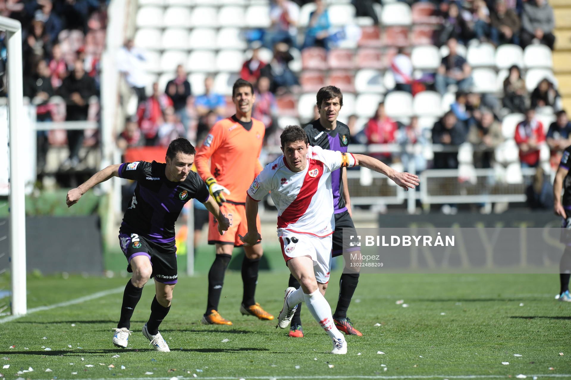 player Rayo Vallecano Foward Piti (10) with Player Real