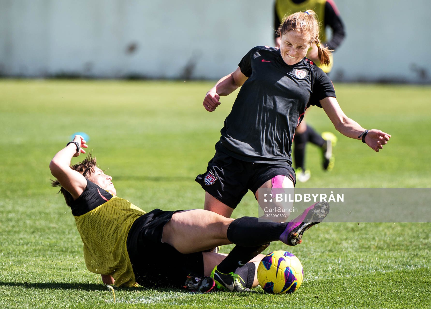 Abby Wambach, glidtacklar Christie Rampone, USA