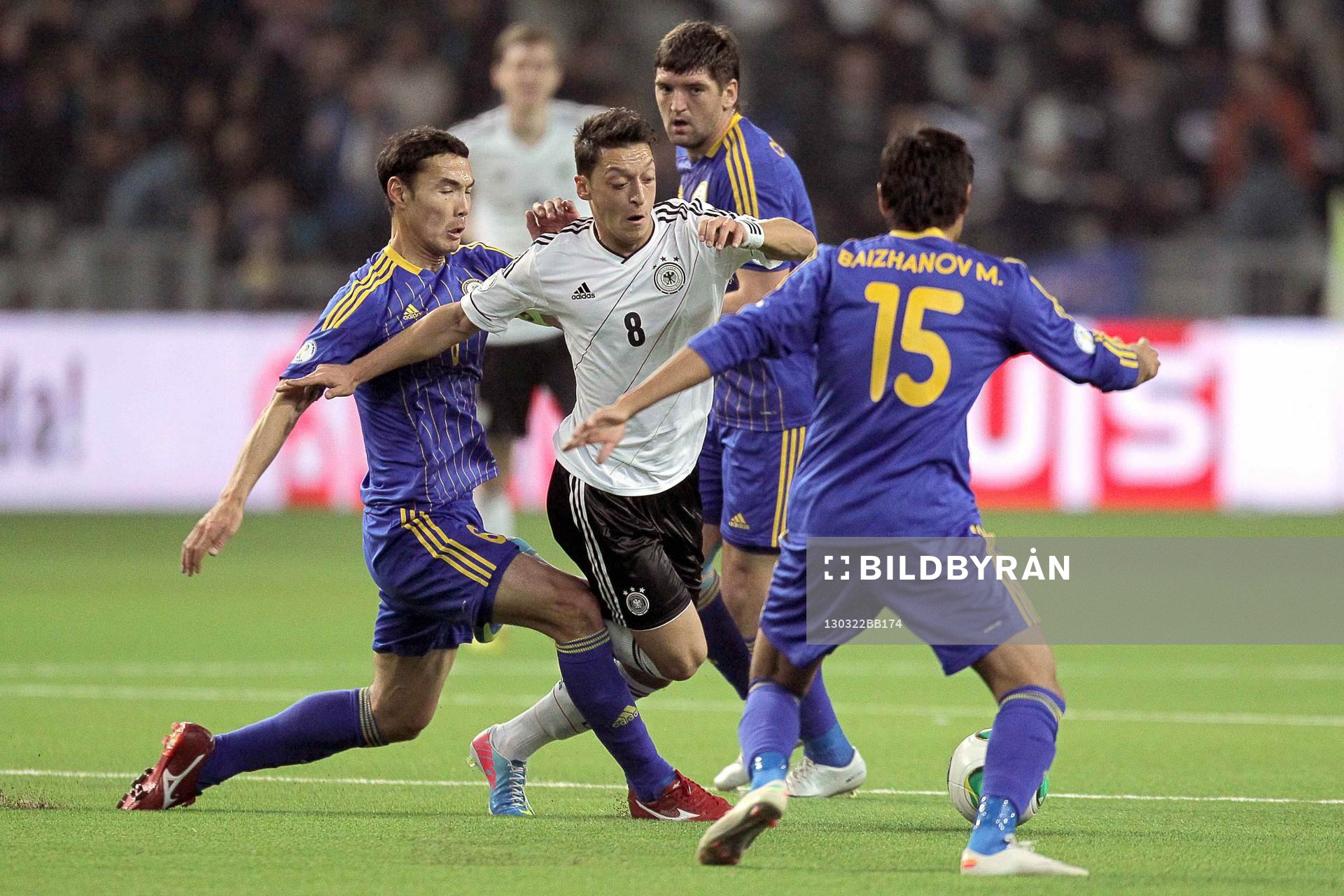 Mesut Ozil / Maksat Baizhanov - 22.03.2013 - Kazakhstan /