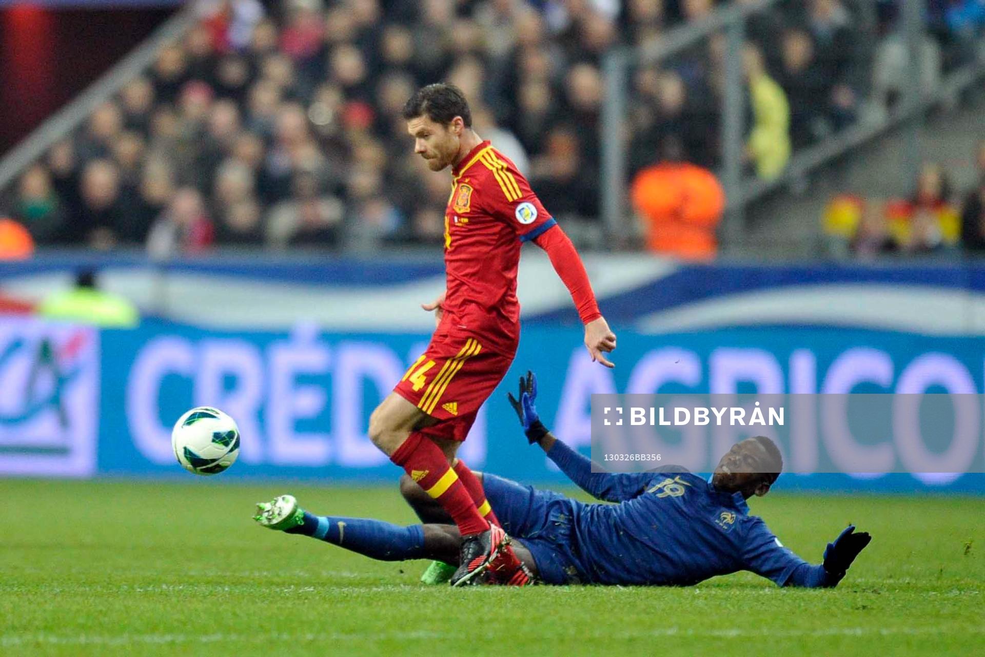  Fotboll, VM-kval, Frankrike - Spanien: Paul POGBA / Xabi ALONSO  - 26.03.2013 - France / Espagne - Eliminatoire Coupe du Monde 2014