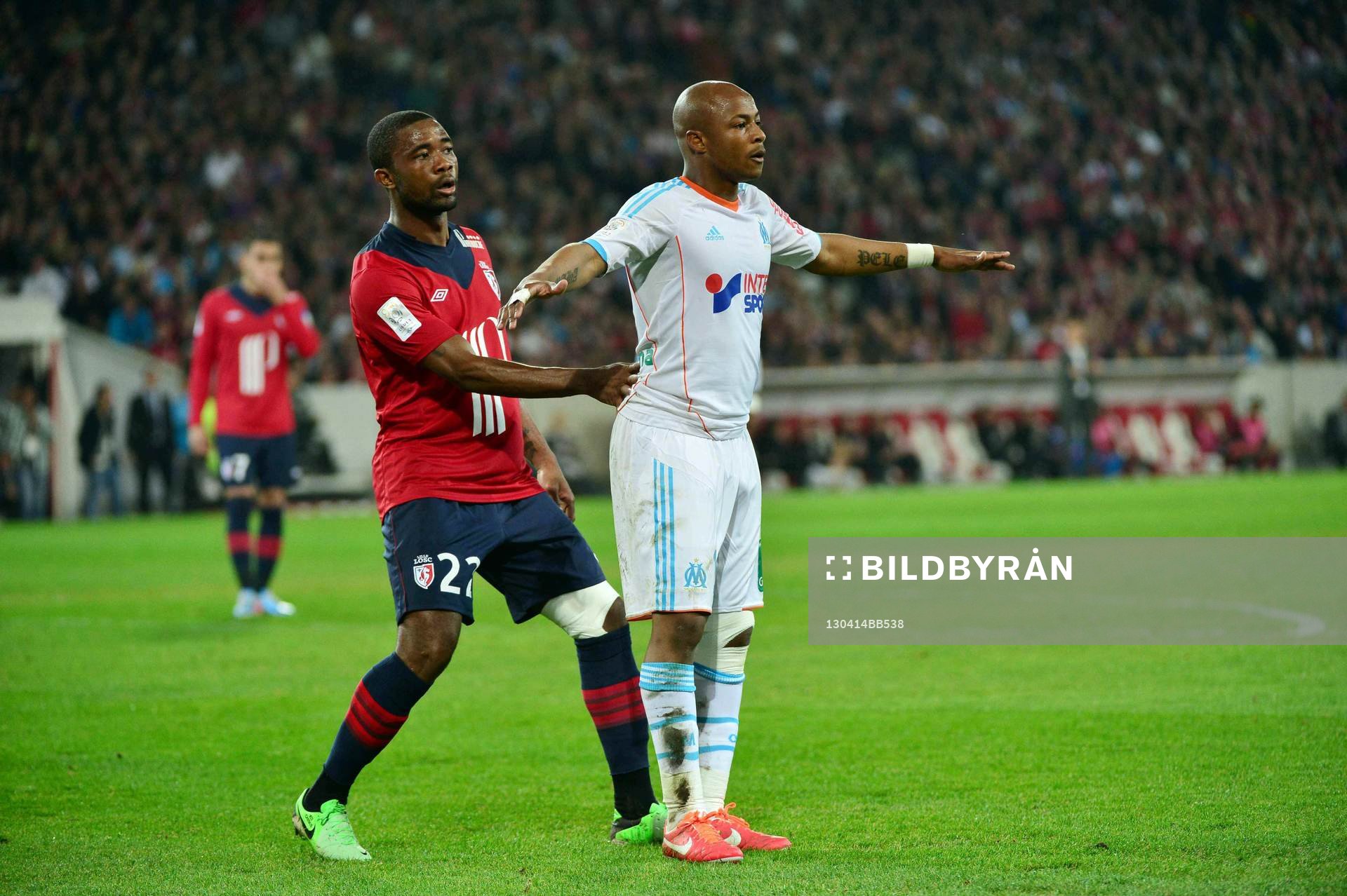  Fotboll, Franska ligan, Lille - Marseille: Aurelien CHEDJOU / Andre AYEW - 14.04.2013 - Lille / Marseille  - 32eme journee de Ligue 1
