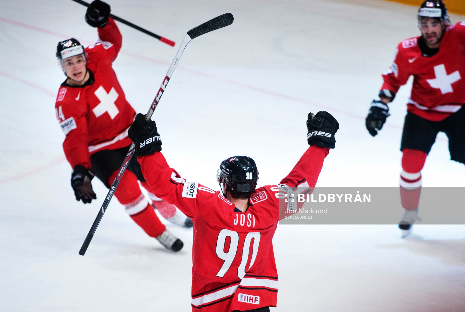 Schweiz Reto Suri, Roman Josi och Andres Ambuhl jublar
