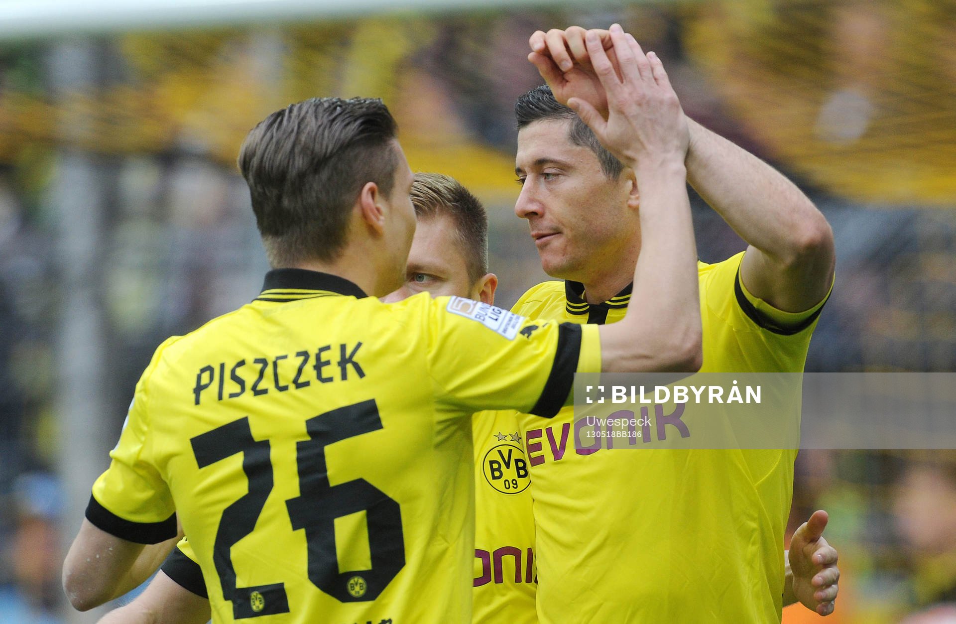 el v.l. Lukasz Piszczek, Jakub Kuba Blaszczykowski, Torschuetze Robert Lewandowski (Dortmund)