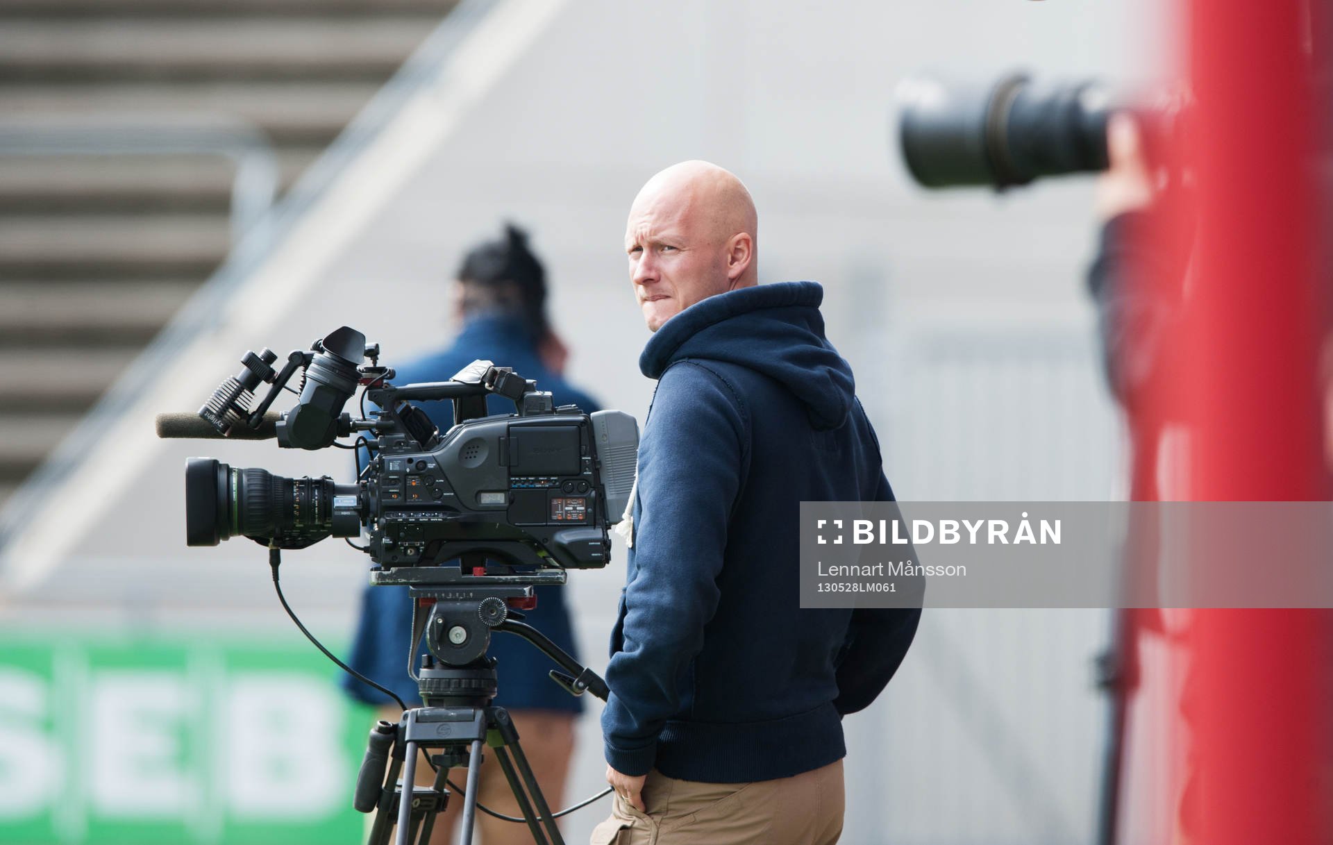 Filmfotograf, filmkamera, stativ
