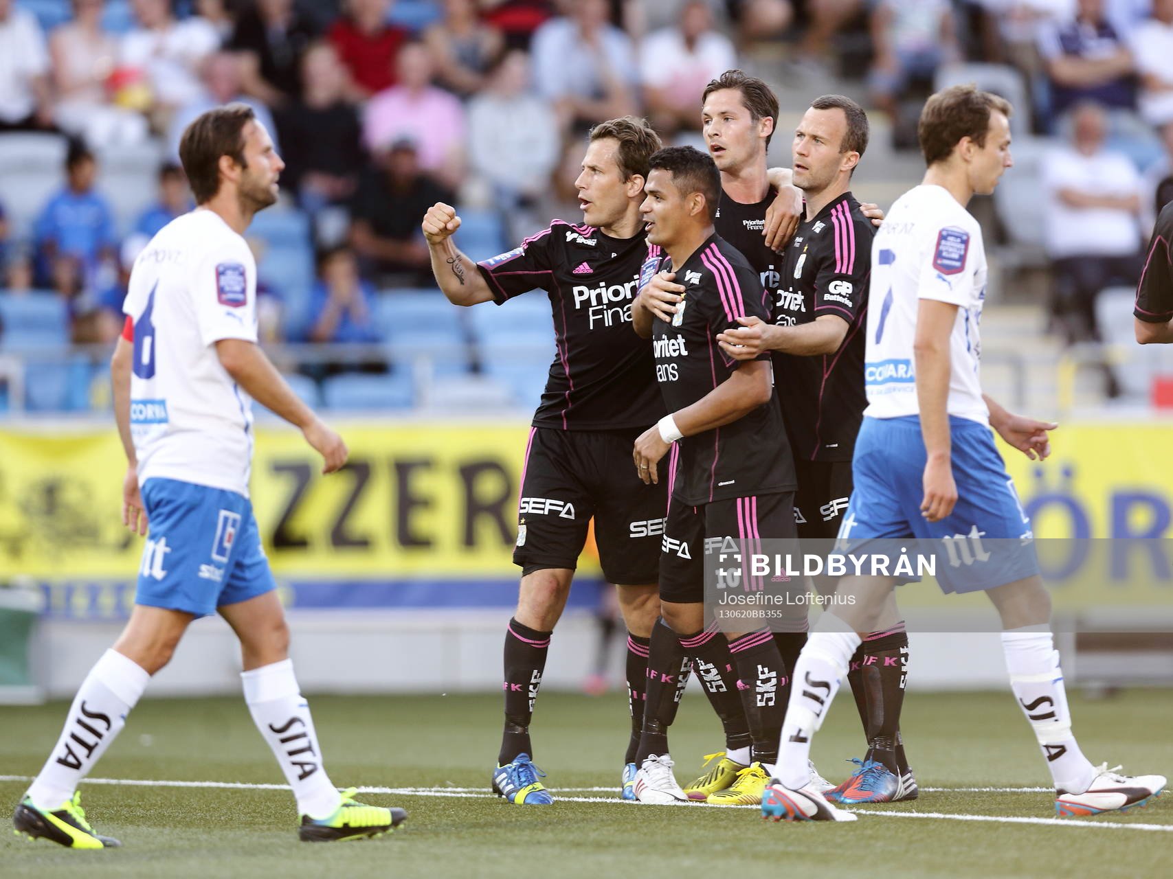 Mål av Göteborgs Philip Haglund, Göteborgs Tobias Hysén och Göteborgs Daniel Sobralense jublar i matchen mellan IFK Norrköping och IFK Göteborg i Allsvenskan i fotboll den 20 juni 2013 i Norrköping.