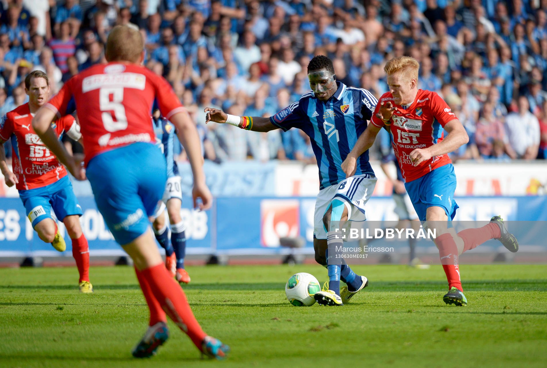 Daniel Amartey och Josef Elvby i matchen mellan Djurgården och Öster den 30 juni 2013 i Stockholm.