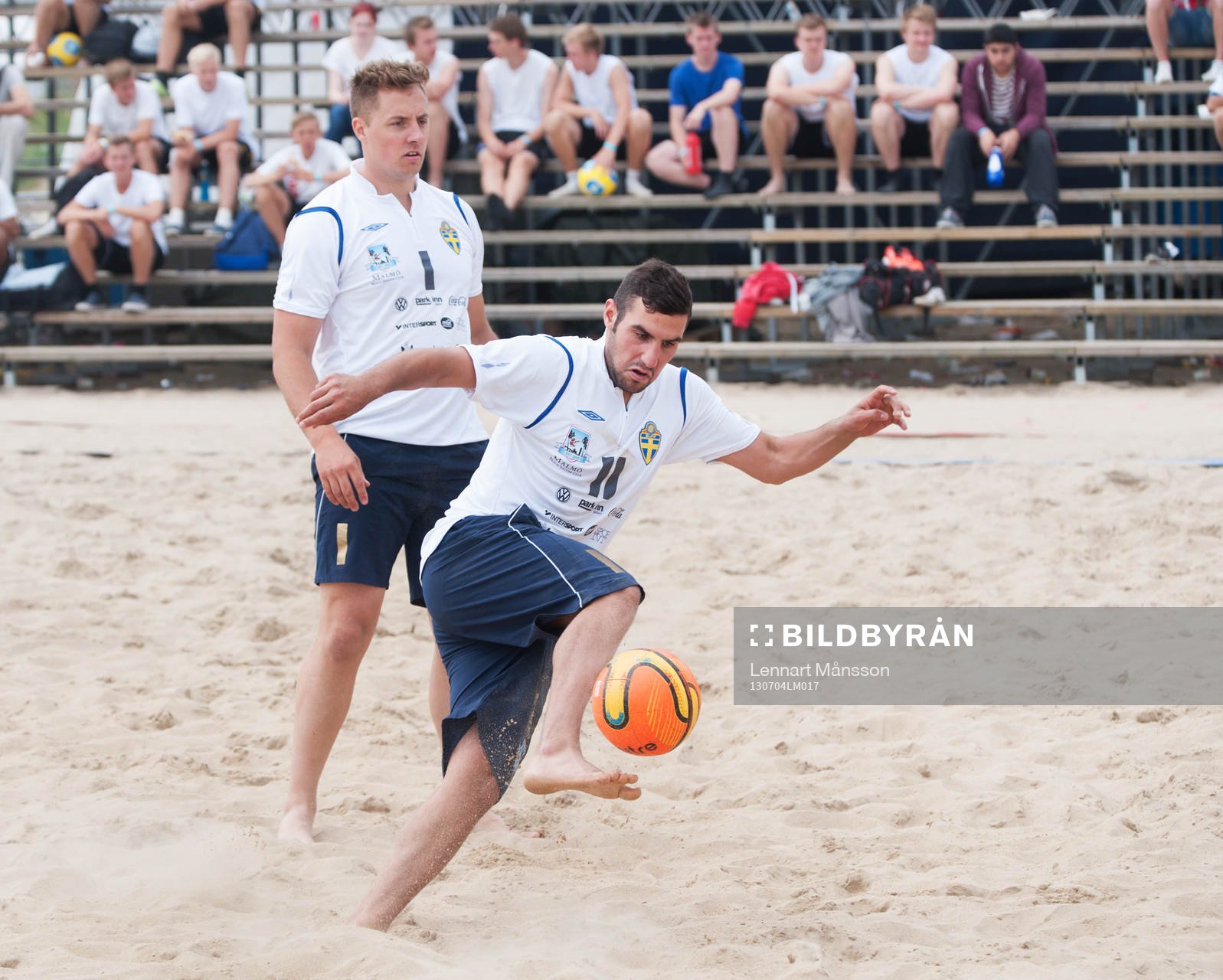 Sand, fotboll, närkamp, havsmiljö