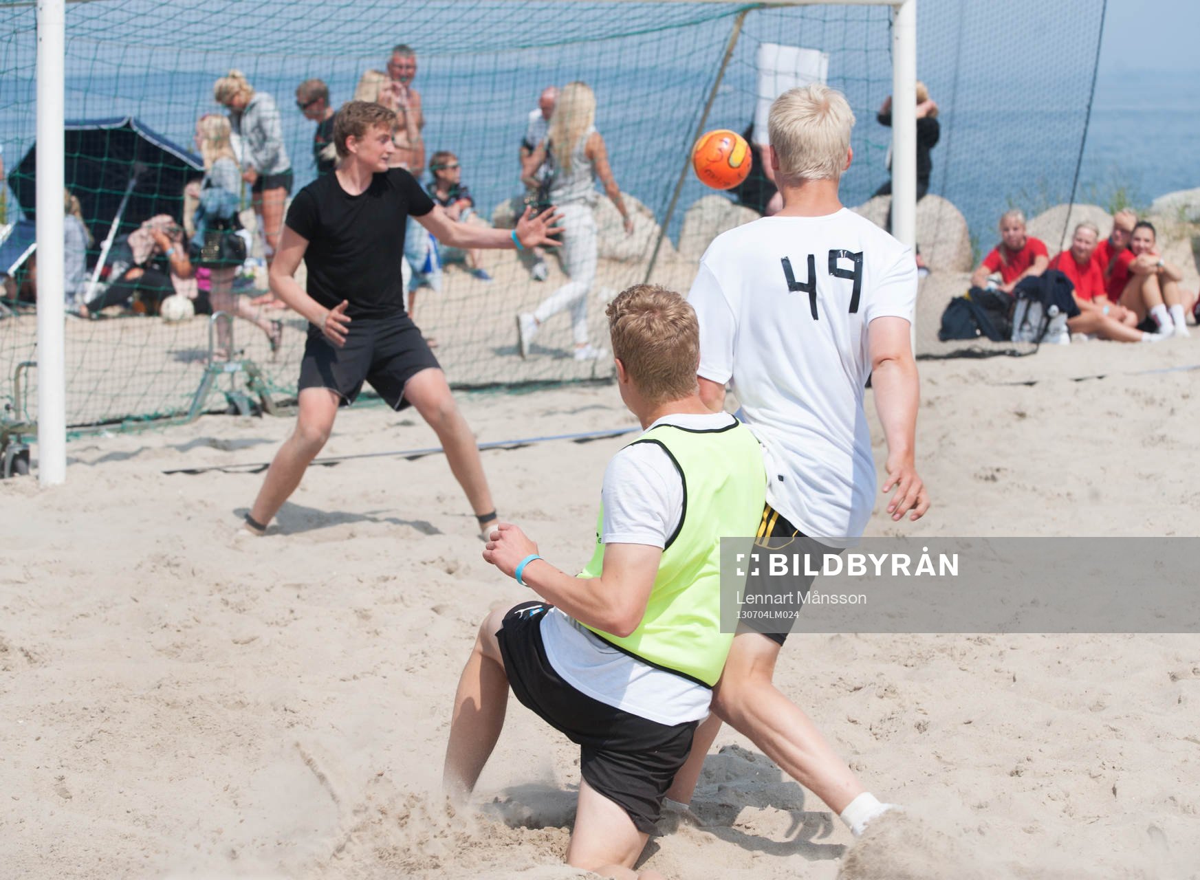 Sand, fotboll, närkamp, havsmiljö, målskott