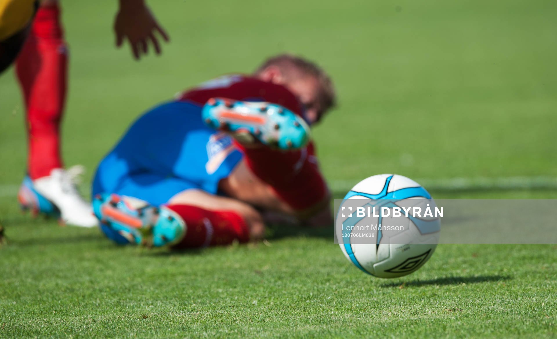 Fotboll och skadad spelare  i