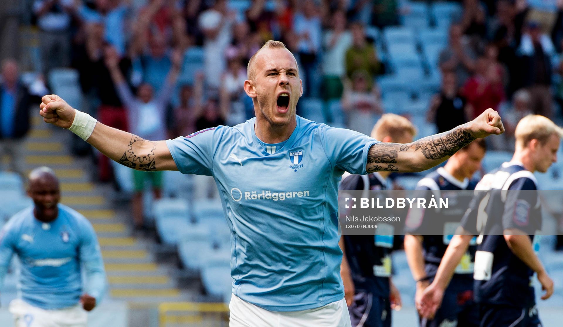 almö FFs Magnus Eriksson jublar efter att ha gjort 1-0 i den allsvenska fotbollsmatchen mellan Malmö FF och Gefle den 7 Juli 2013.