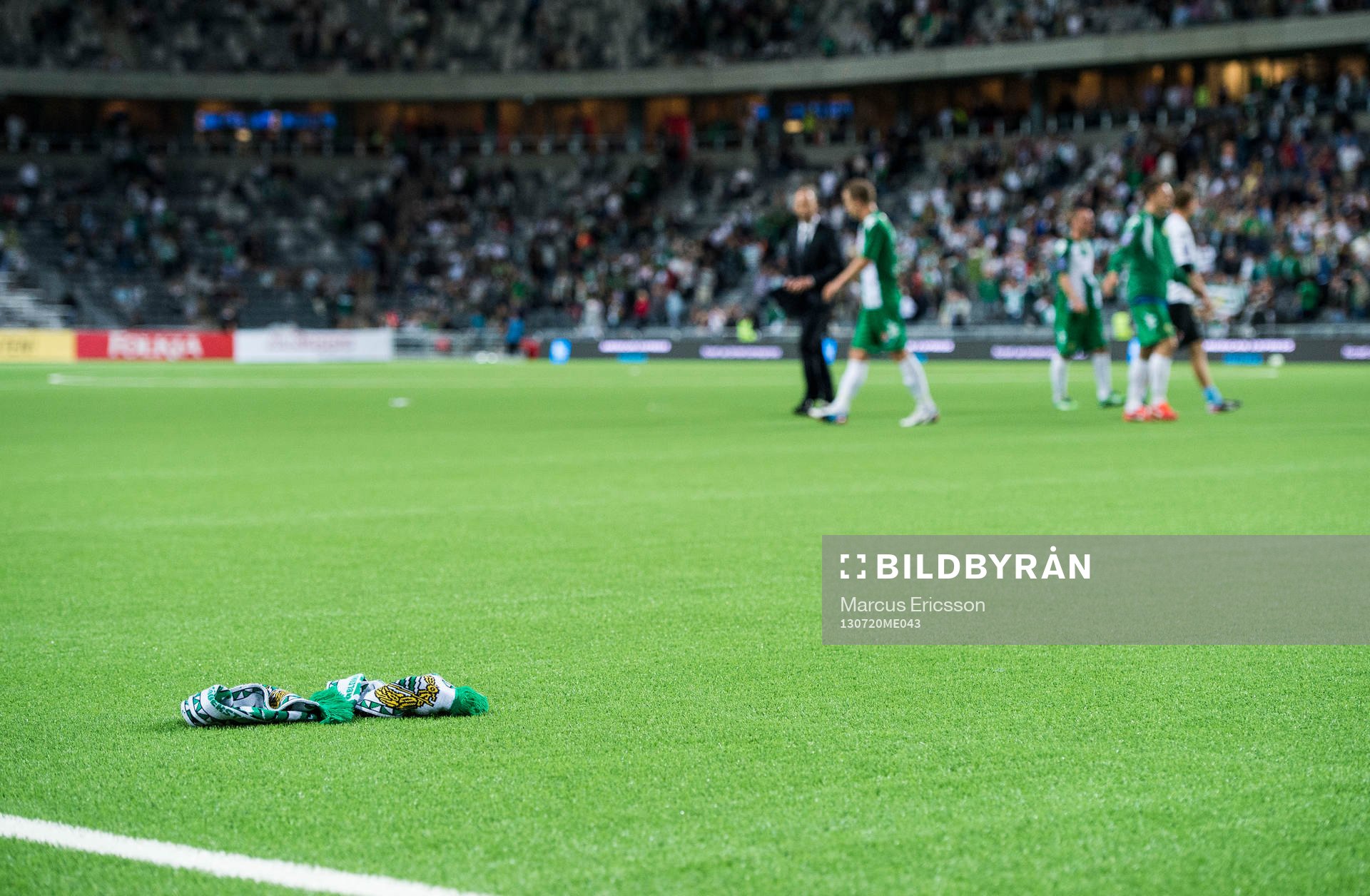 Besvikna Hammarbyfans kastade in halsduken efter fotbollsmatchen i Superettan mellan Hammarby och Örgryte den 20 juli 2013 i Stockholm.