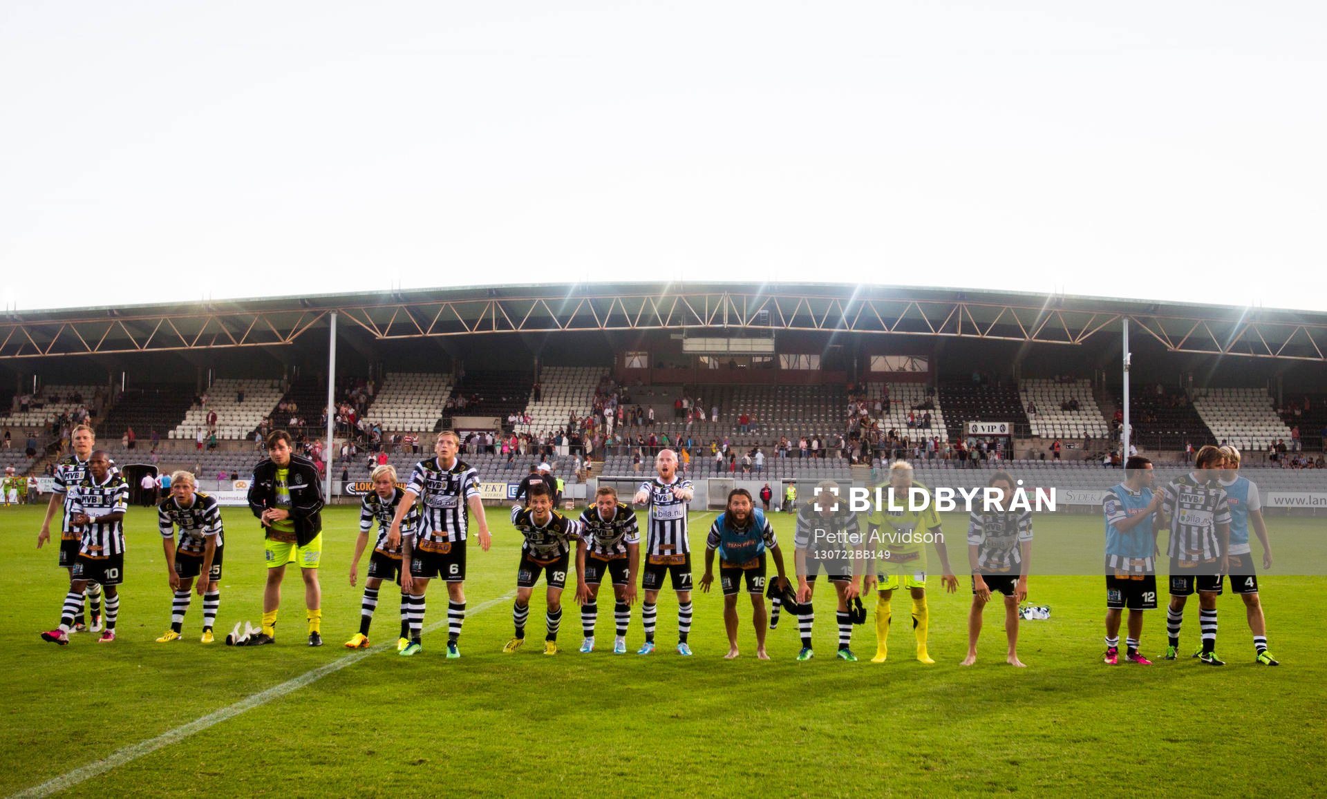 Landskrona jublar mot publiken efter segern med 5-0 i fotbollsmatchen i Superettan mellan Landskrona och Varberg den 22 juli 2013 i Landskrona.