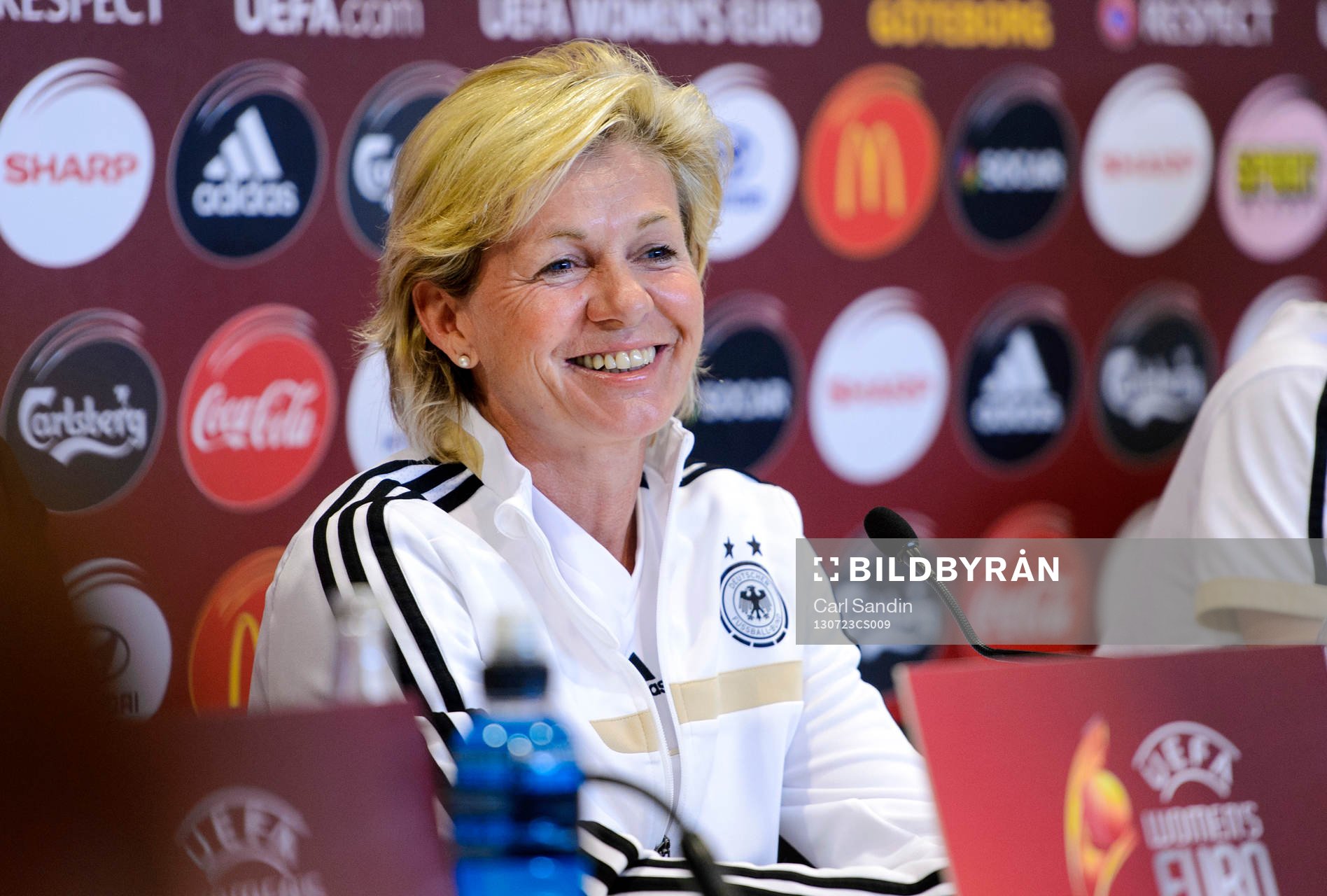Tysklands förbundskapten Silvia Neid ser glad ut under presskonferensen inför semifinalen mot Sverige i dam-EM i fotboll 23 juli 2013 i Göteborg.