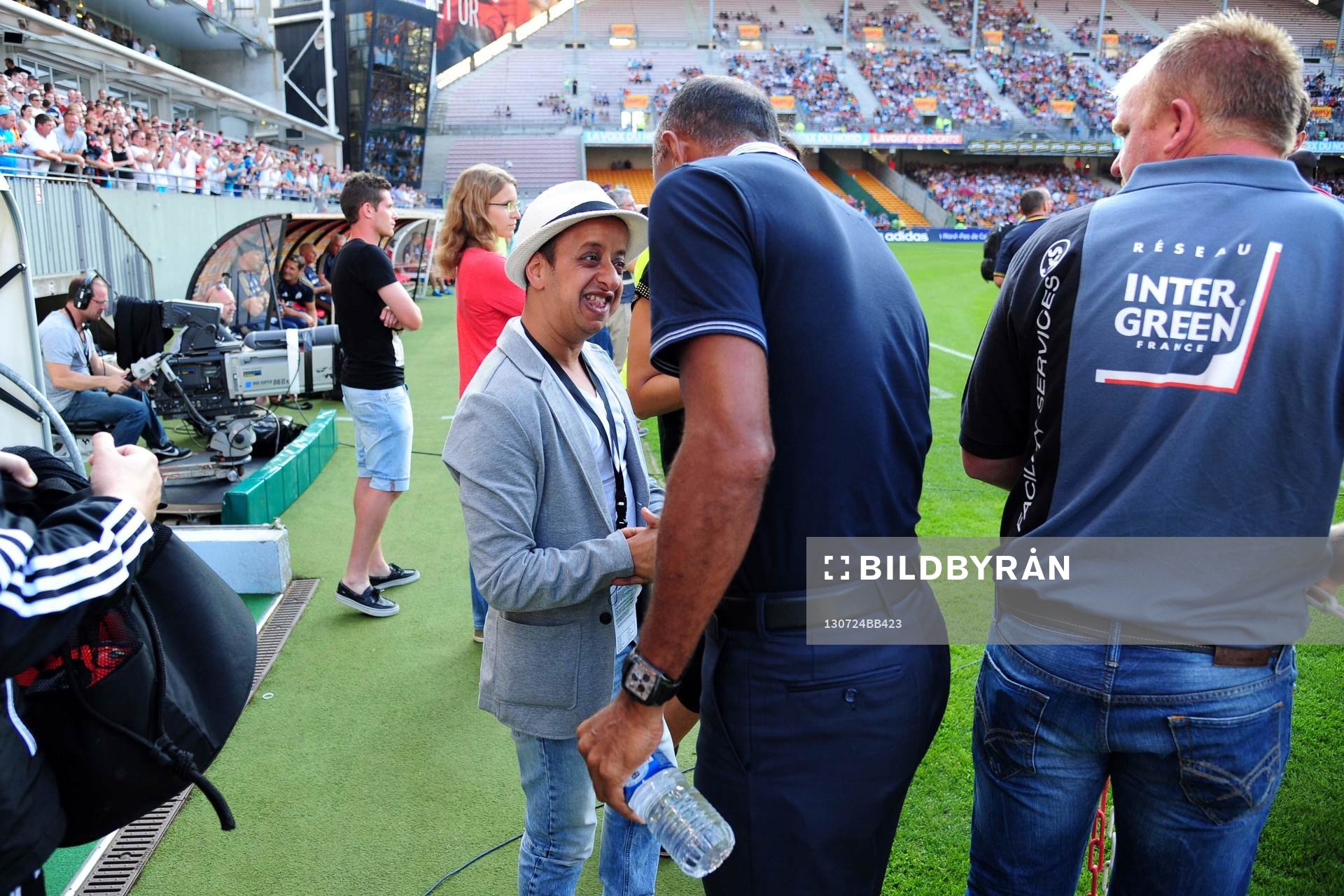  Fotboll, träningsmatch, Lens - Marseille: Booder (Mohamed Benyamna) / Antoine Kombouare - 24.07.2013 - Lens / Marseille - Match Amical -