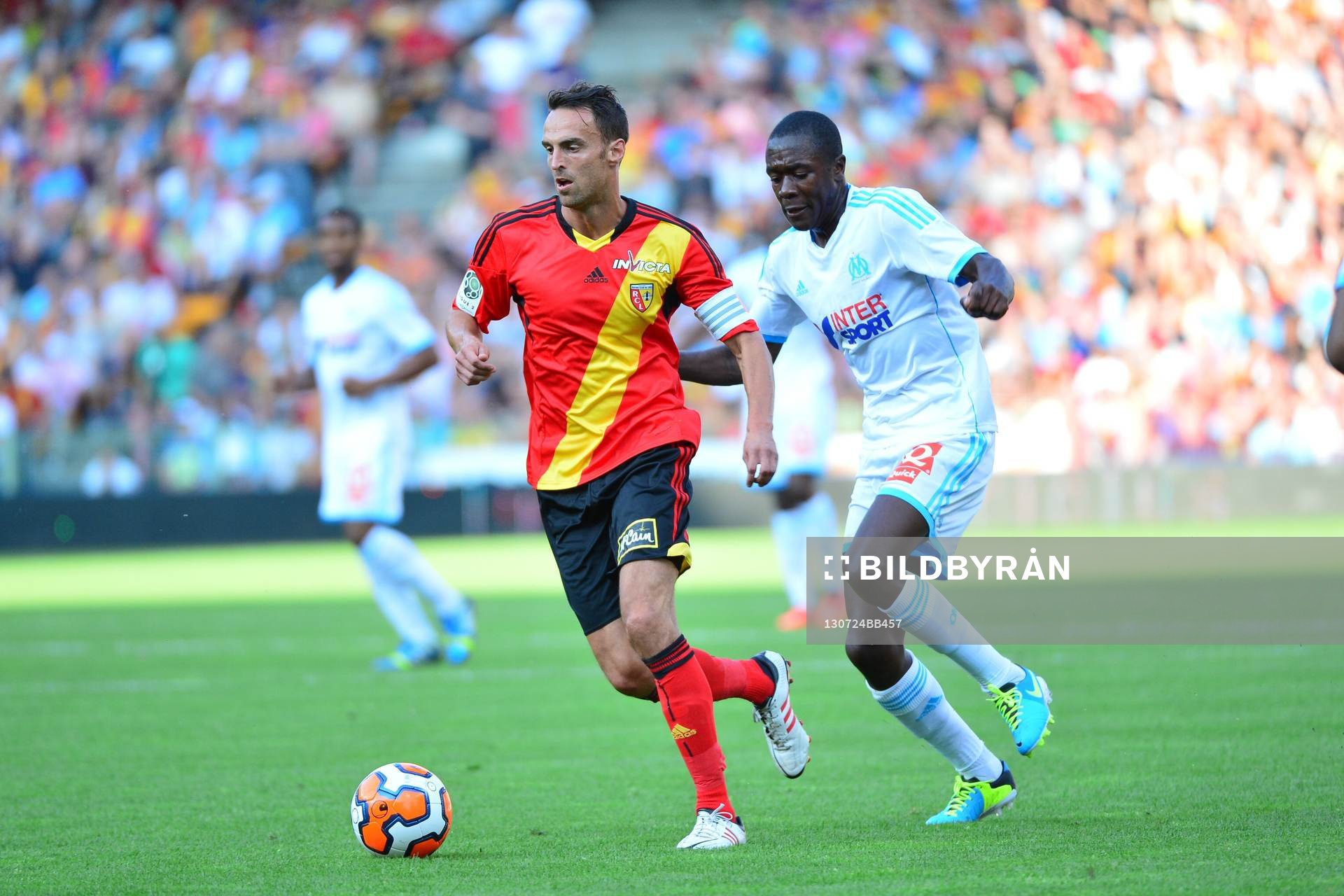  Fotboll, träningsmatch, Lens - Marseille: Jerome Lemoigne / Giannelli Imbula - 24.07.2013 - Lens / Marseille - Match Amical -